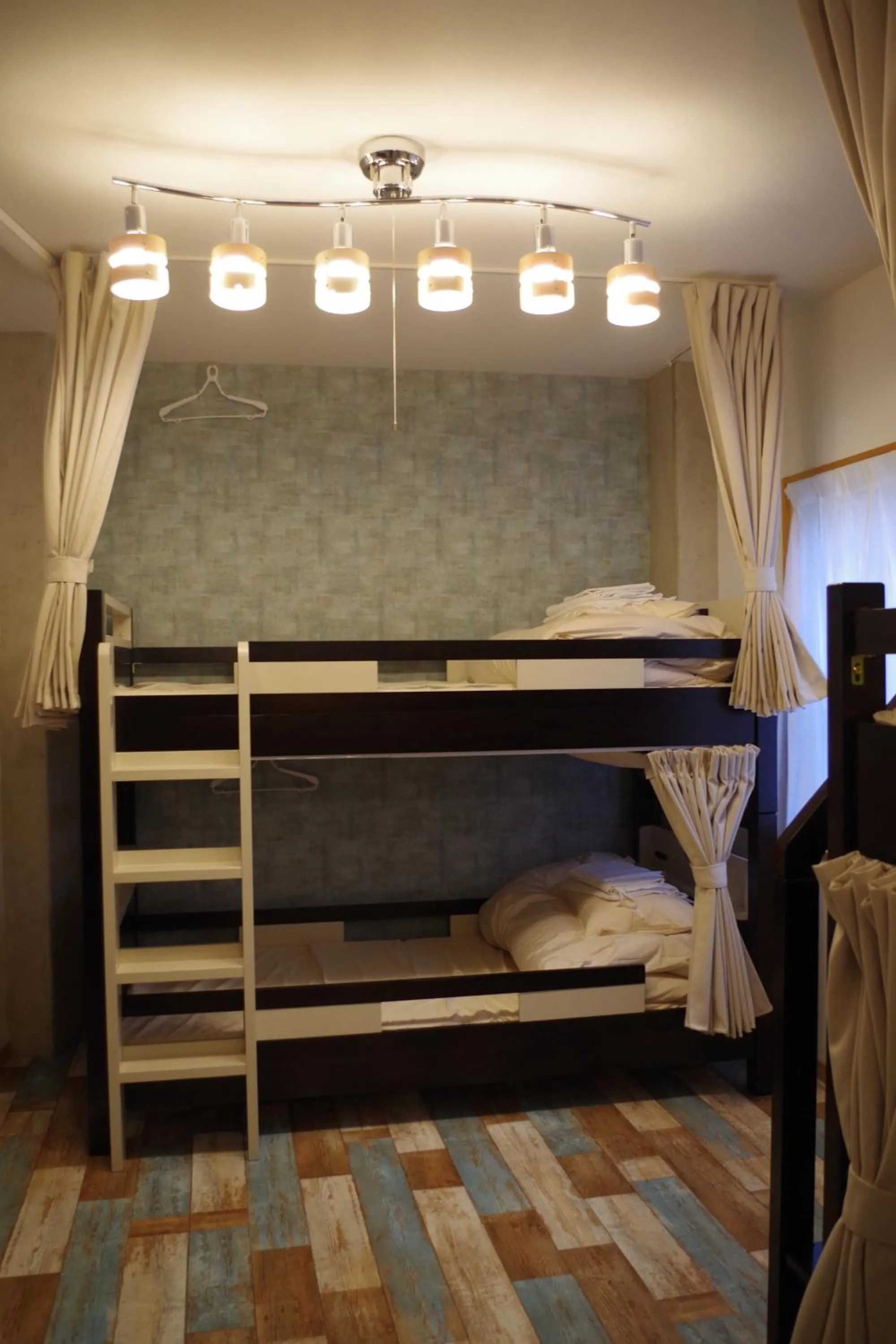 bunk bed, Bed in Cinnamon Guesthouse Dogo