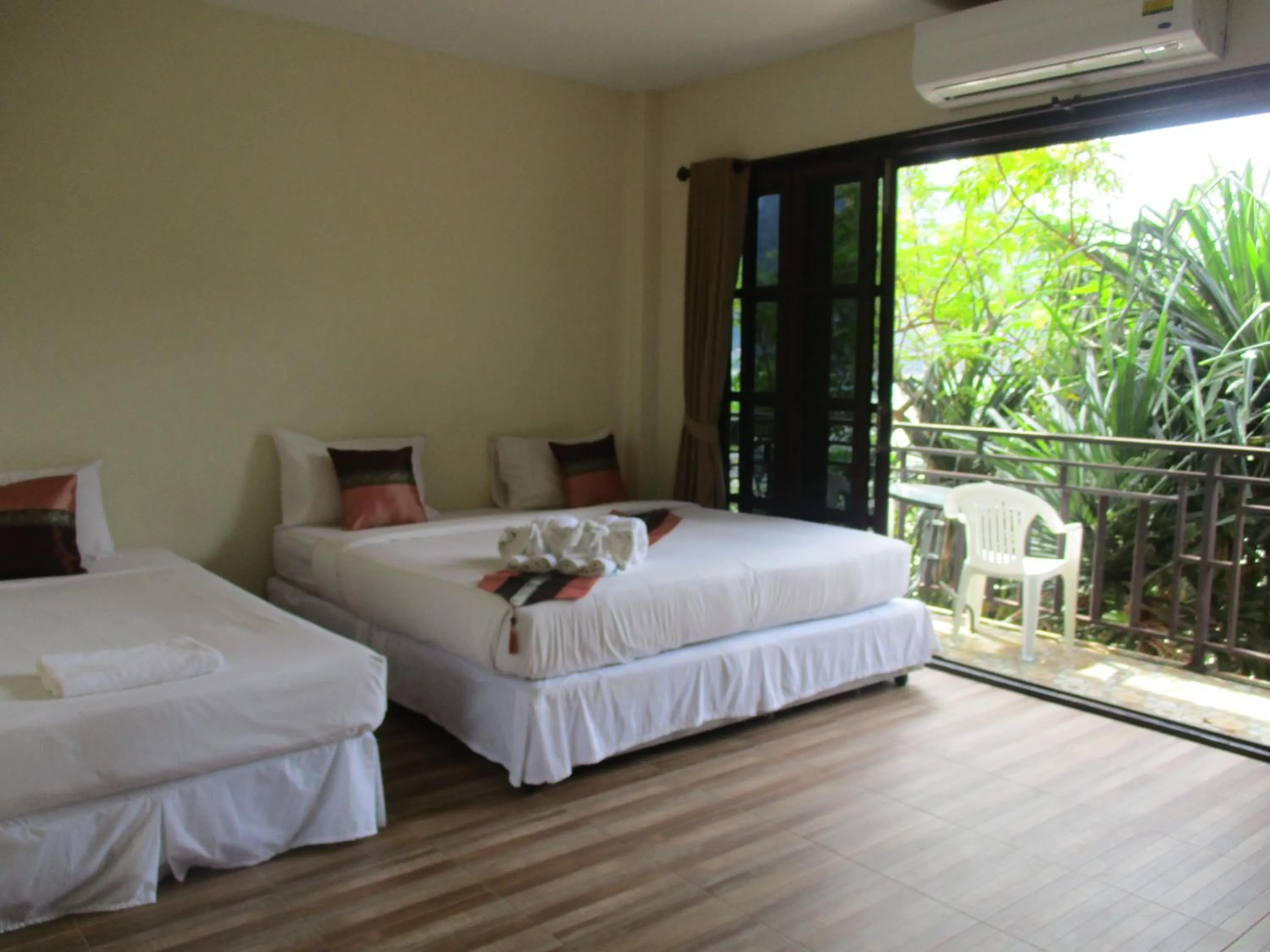 Photo of the whole room, Bed in Phi Phi Green House & Sunsky Hostel