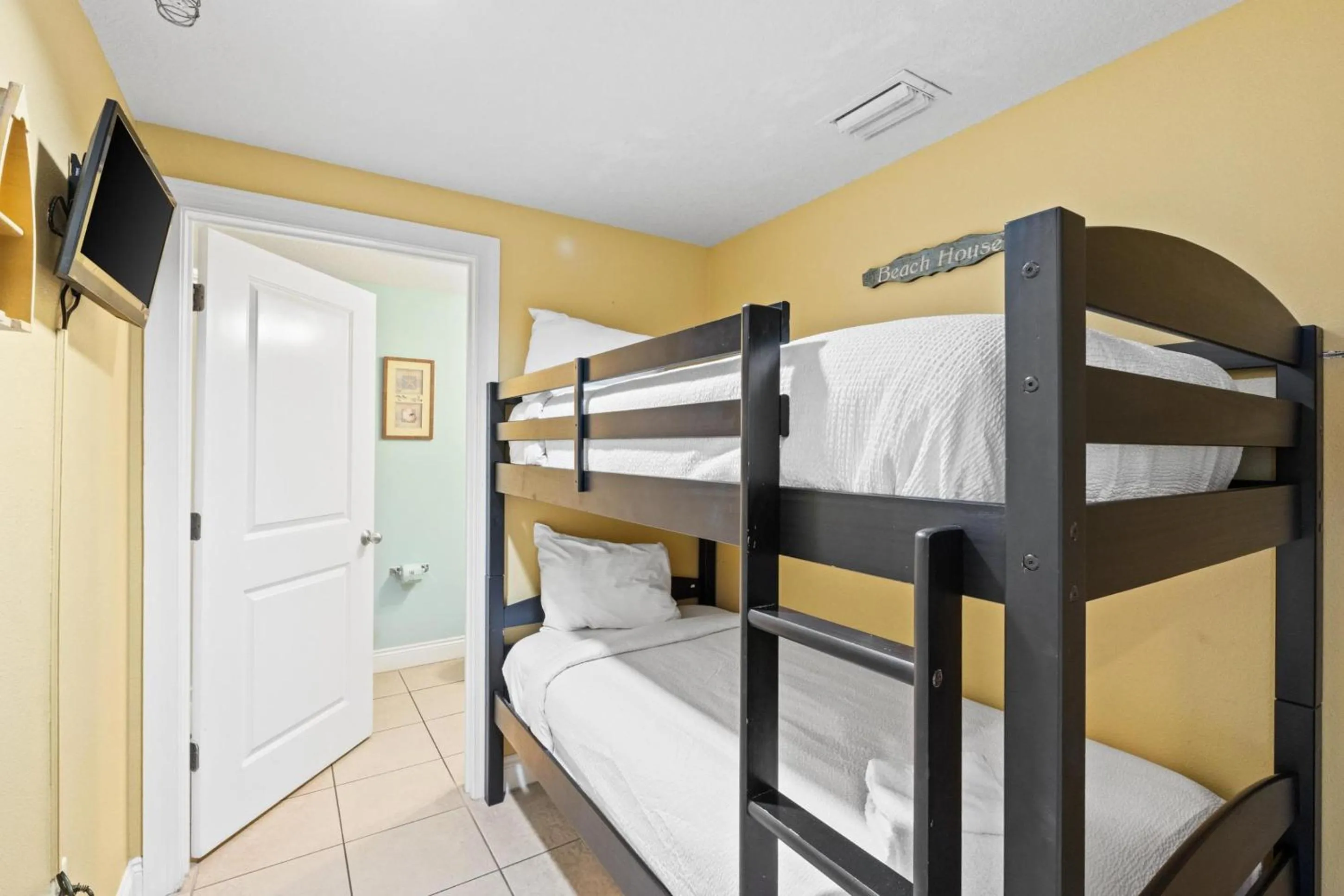Bed in Palazzo Beach Resort by Panhandle Getaways