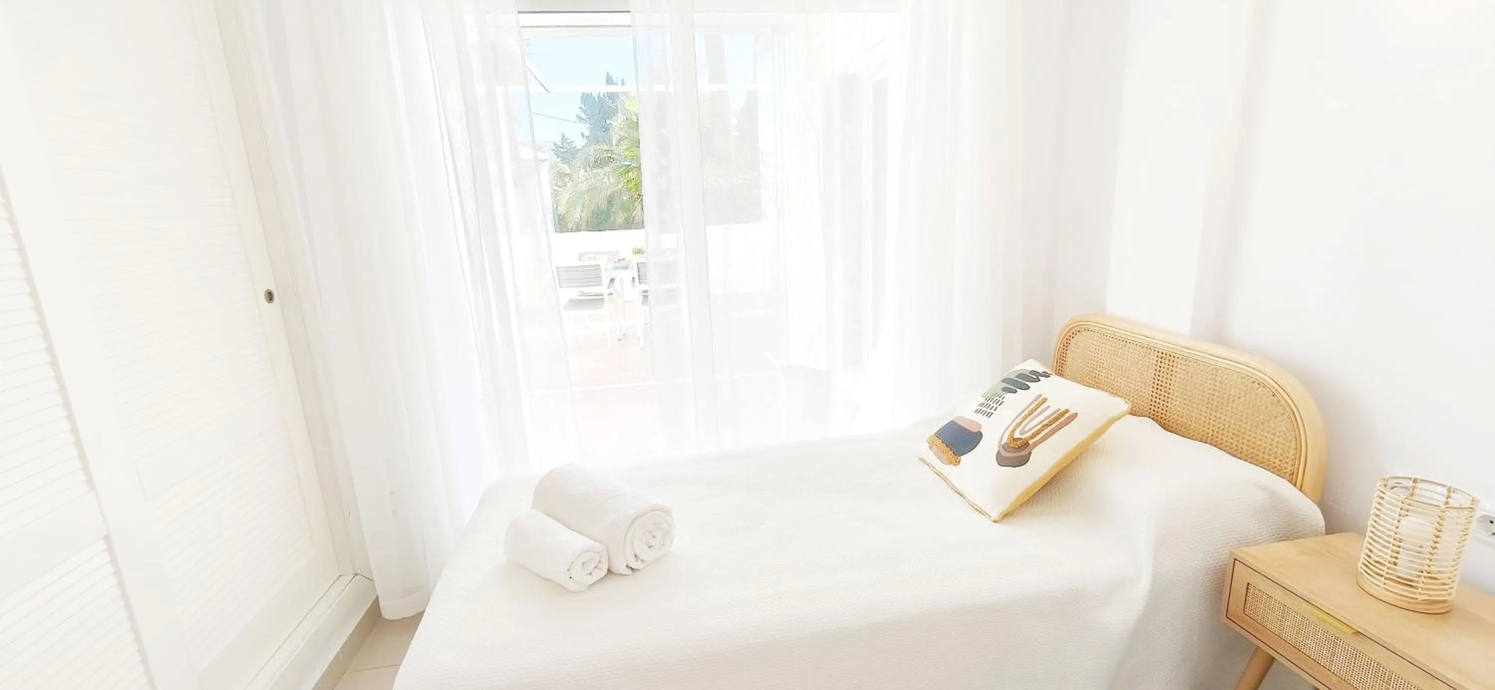 Bed in Apartamento Medina Molins by DENIA COSTA