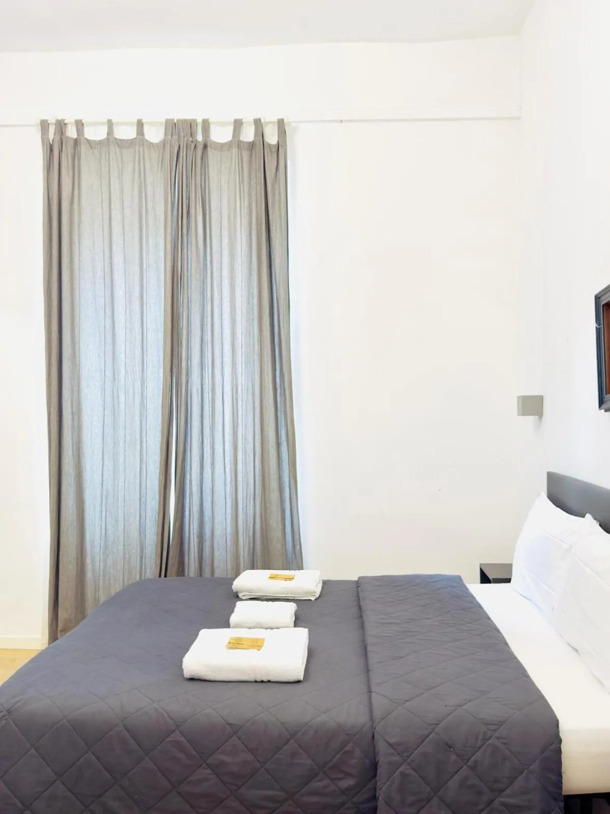 Bed in Oasi Guest House