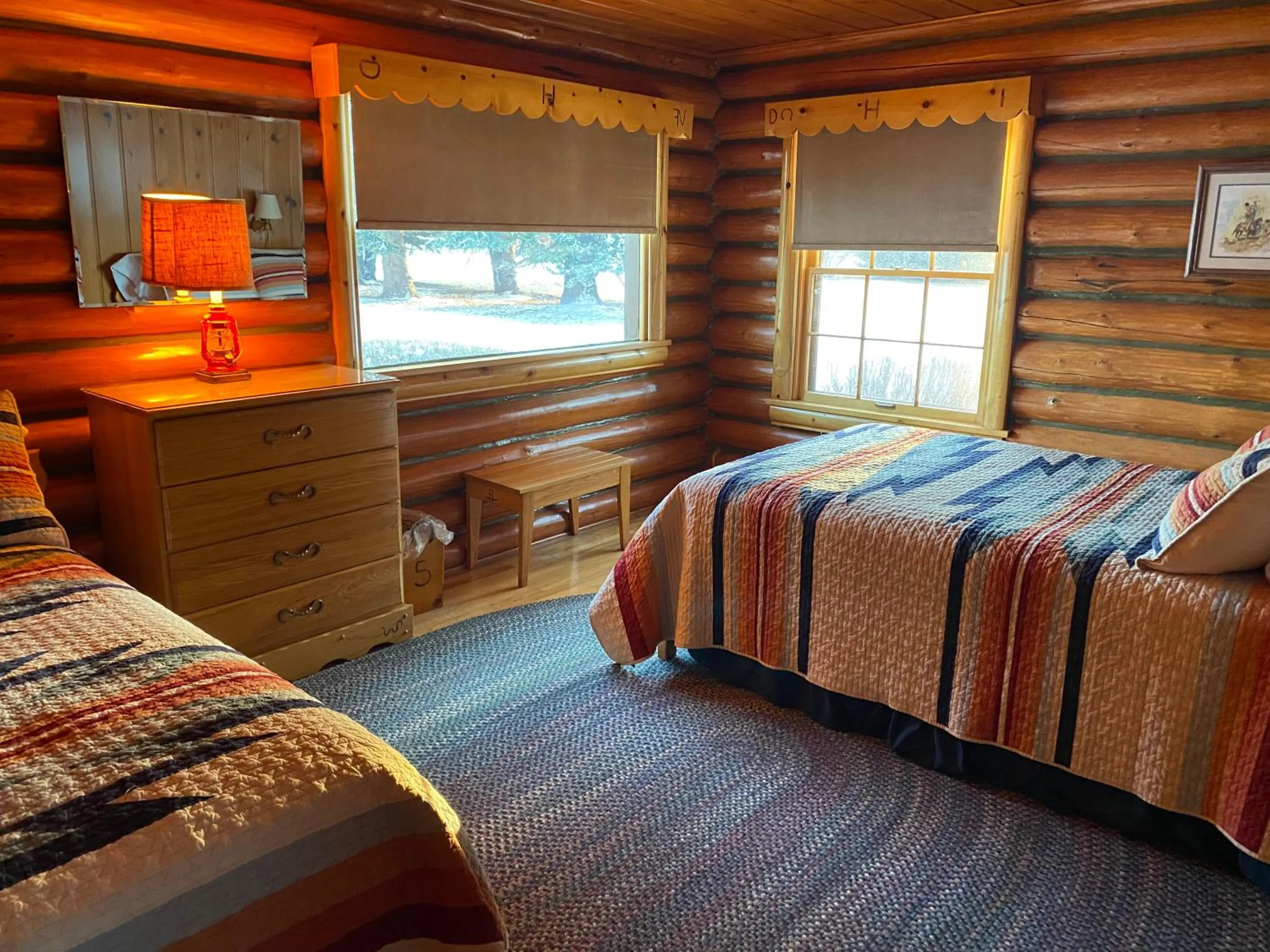 Bed in El Western Cabins & Lodges