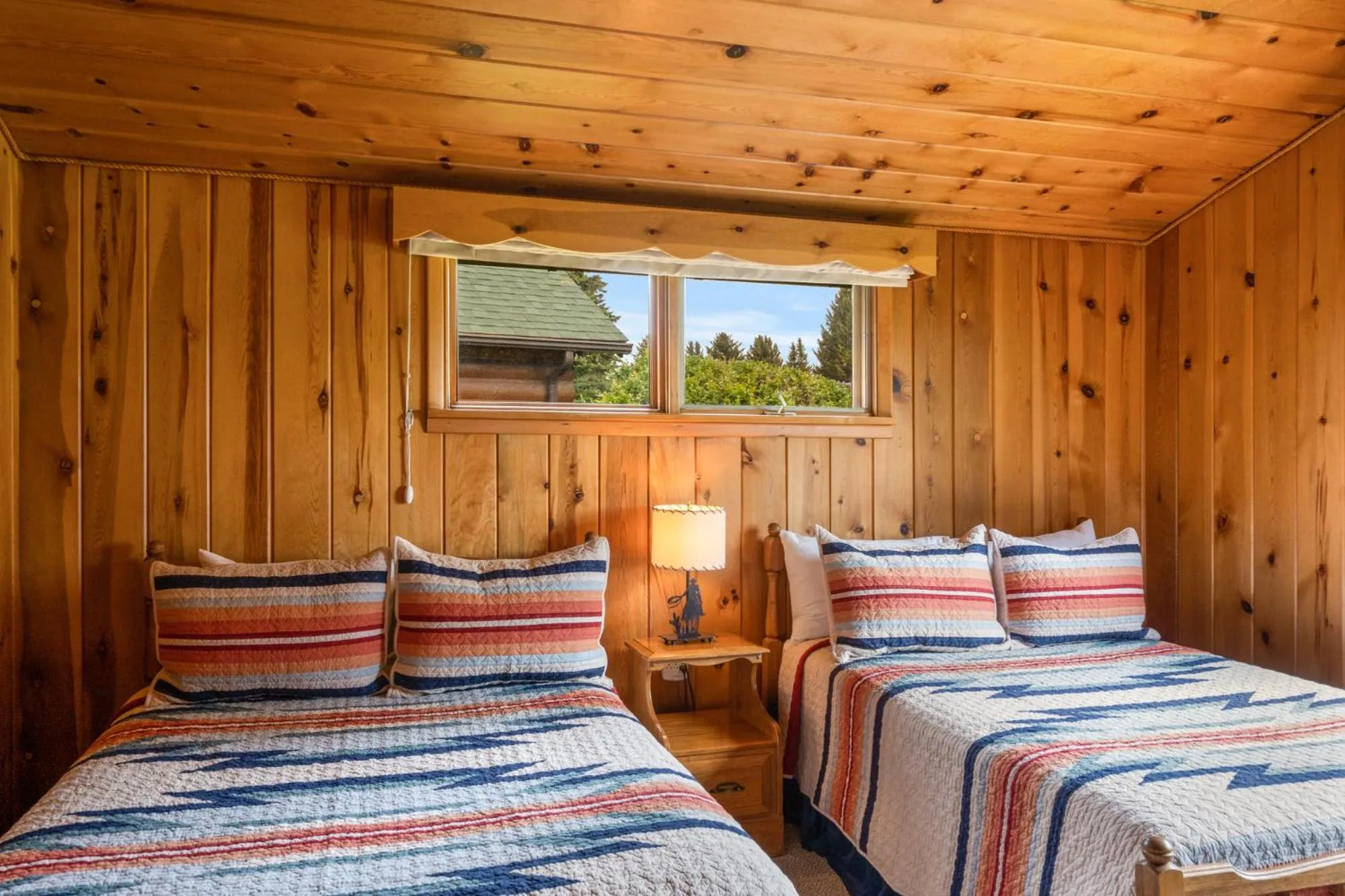 Bed in El Western Cabins & Lodges