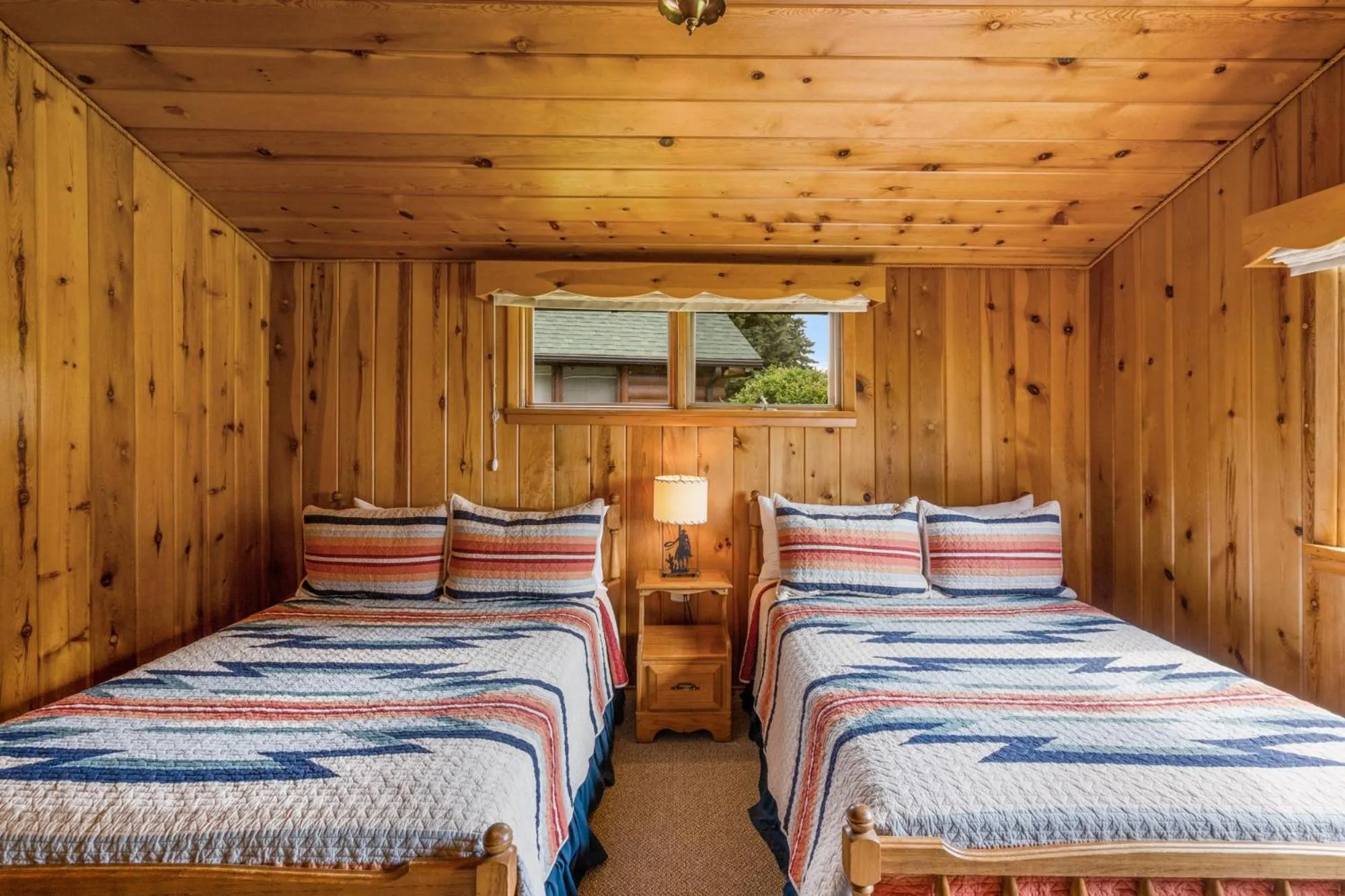 Bed in El Western Cabins & Lodges