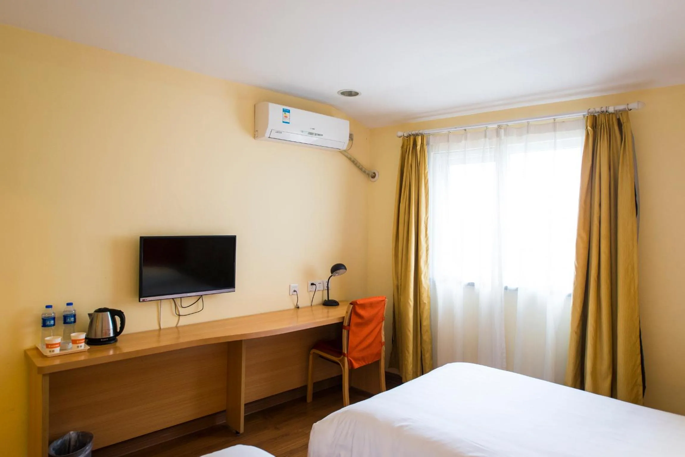 Bed in Home Inn Suzhou Taihu Lake Dongshan Town