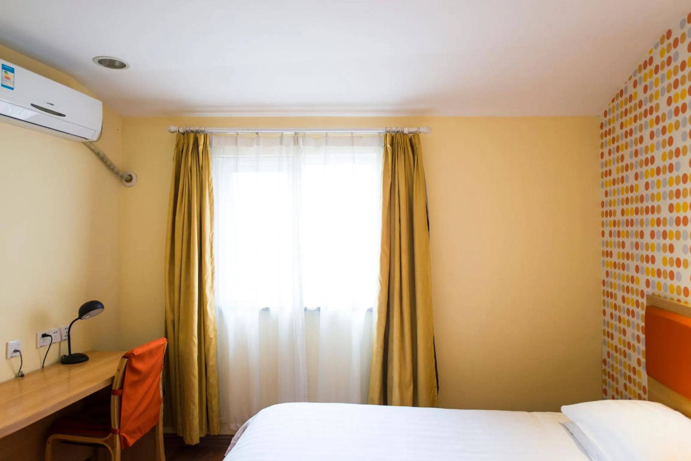 Bed in Home Inn Suzhou Taihu Lake Dongshan Town