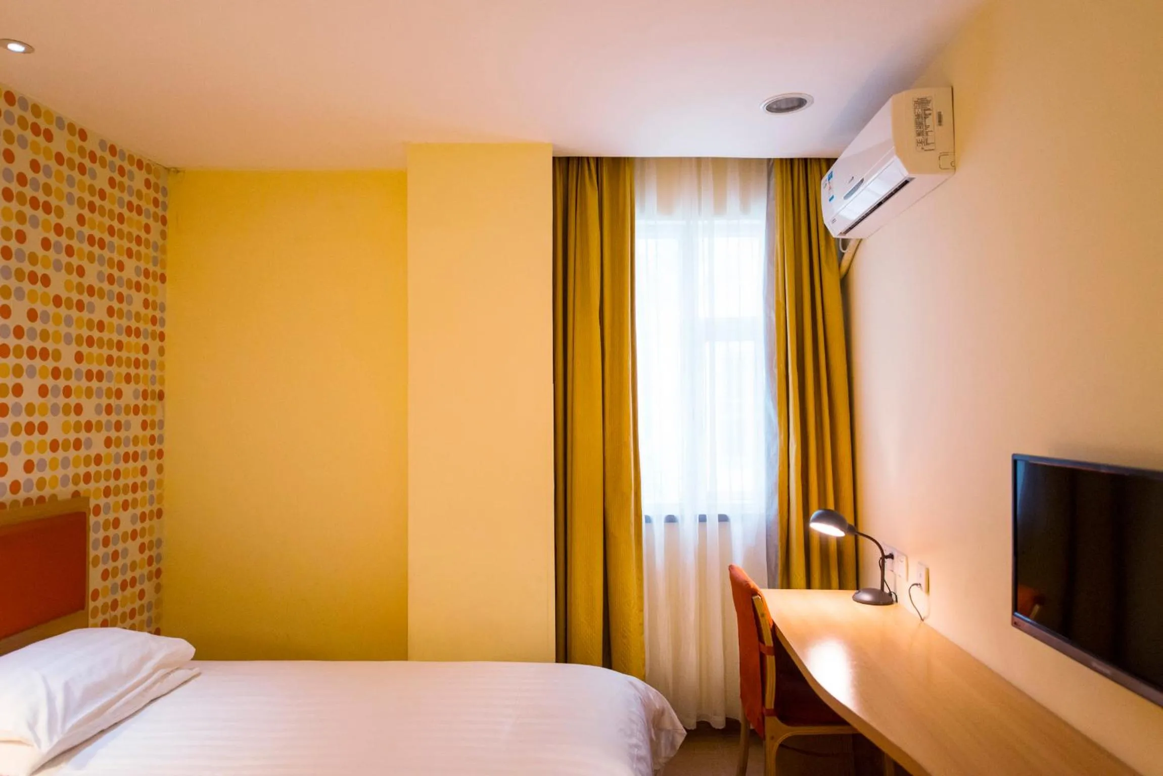 Bed in Home Inn Suzhou Taihu Lake Dongshan Town