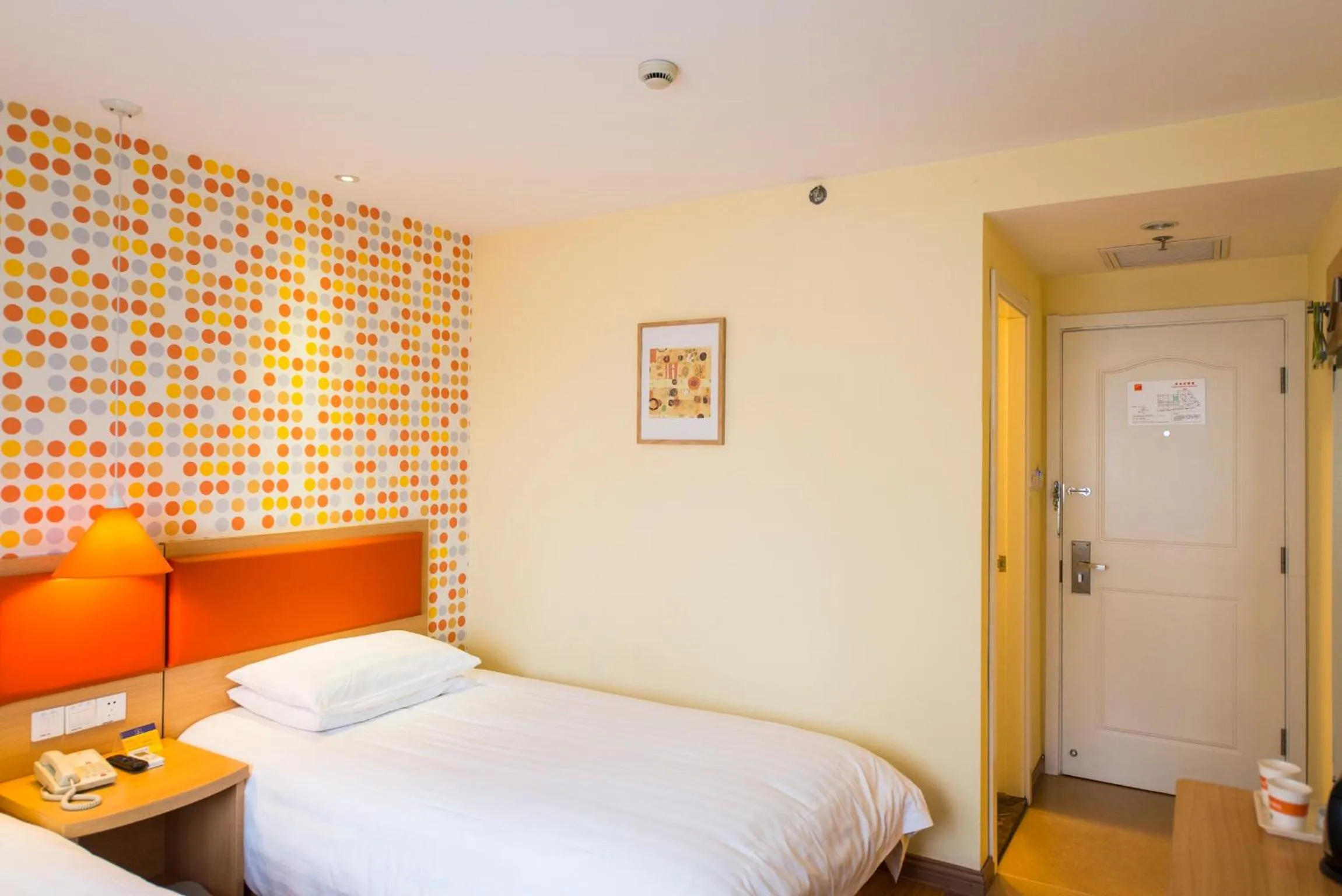 Bed in Home Inn Suzhou Taihu Lake Dongshan Town