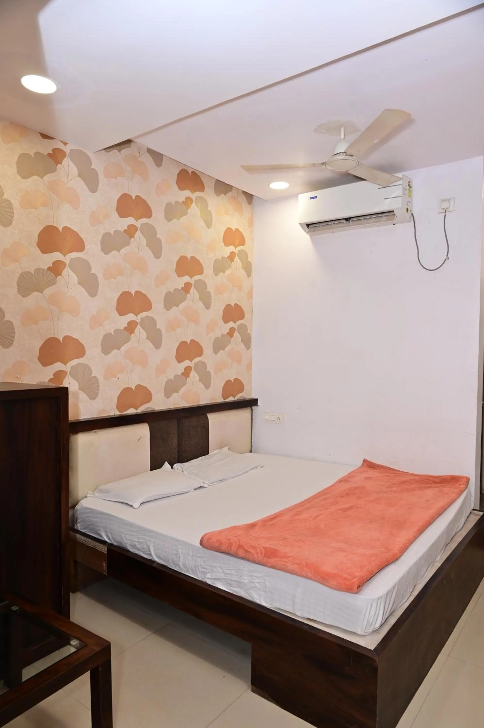 Bed in Sri Shivam Hotel