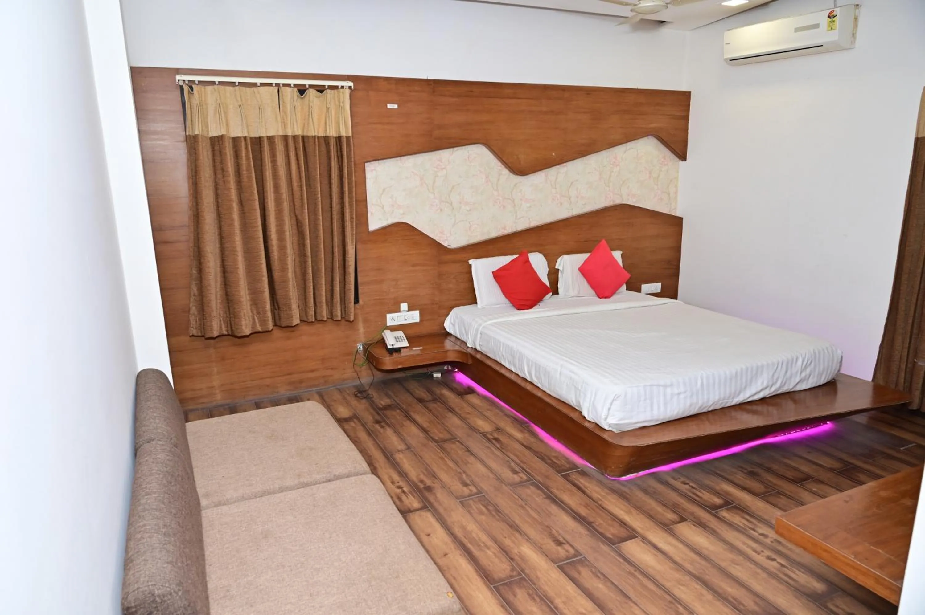 Bed in Sri Shivam Hotel