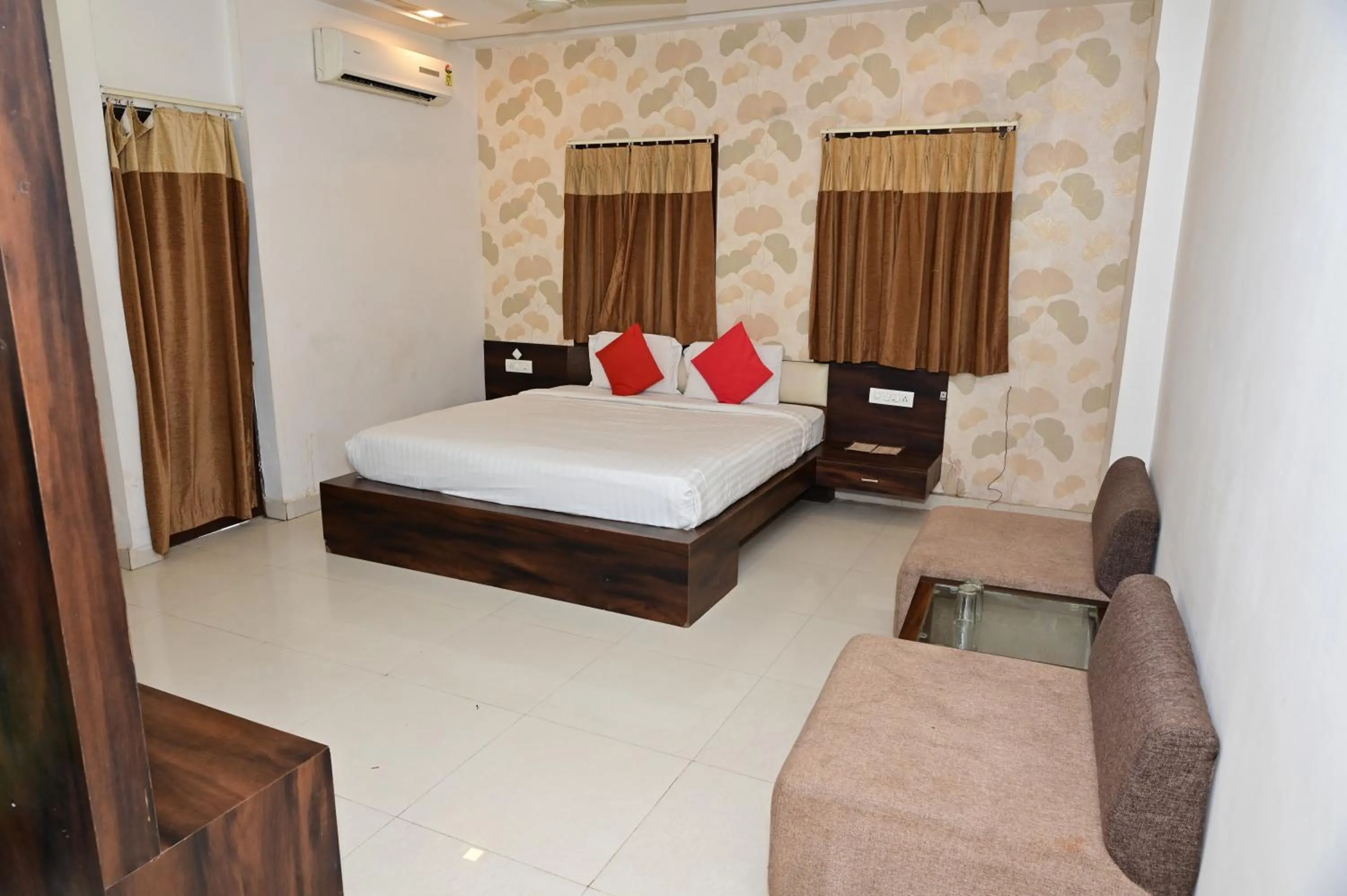 Bed in Sri Shivam Hotel