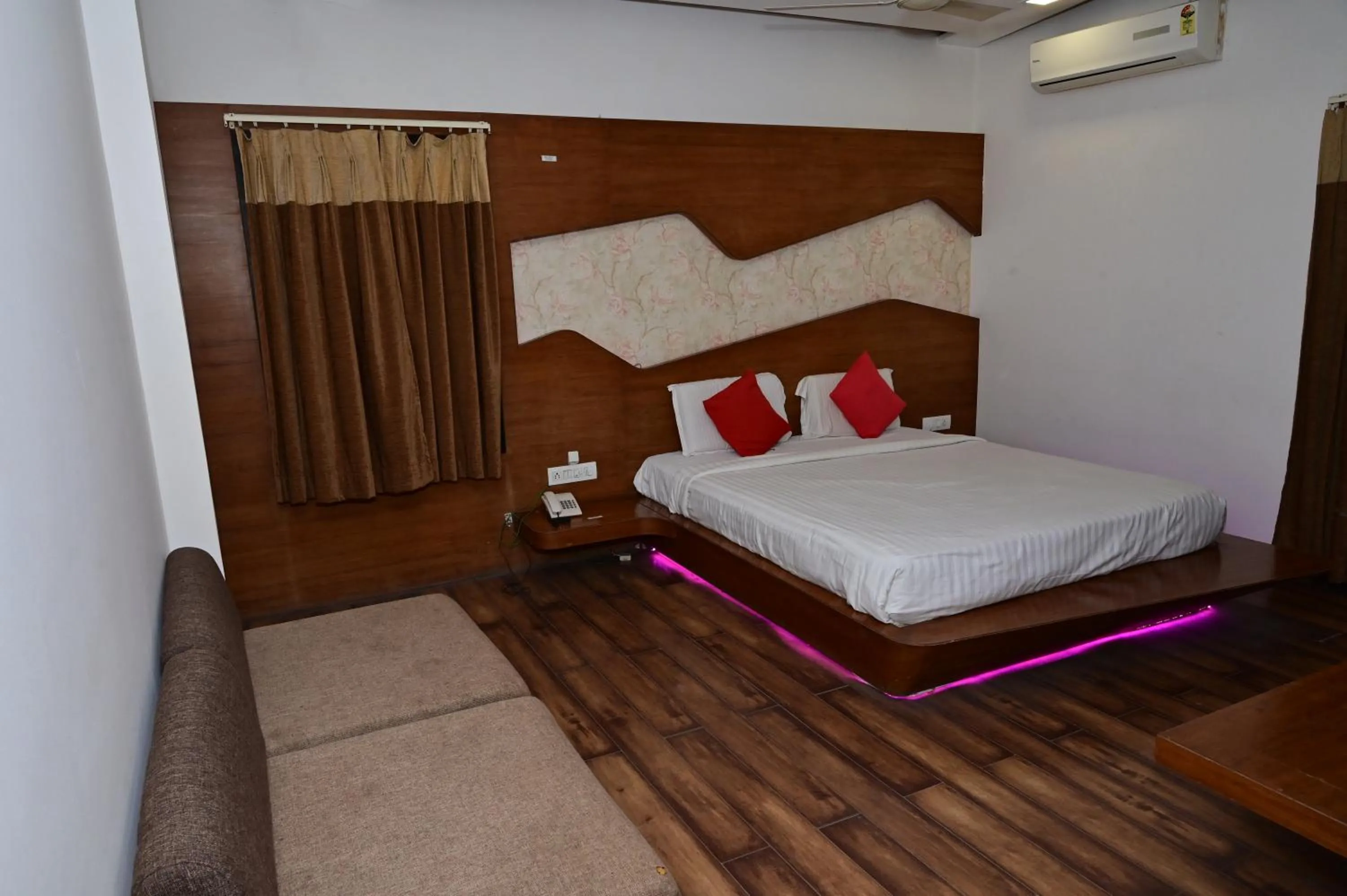 Bed in Sri Shivam Hotel