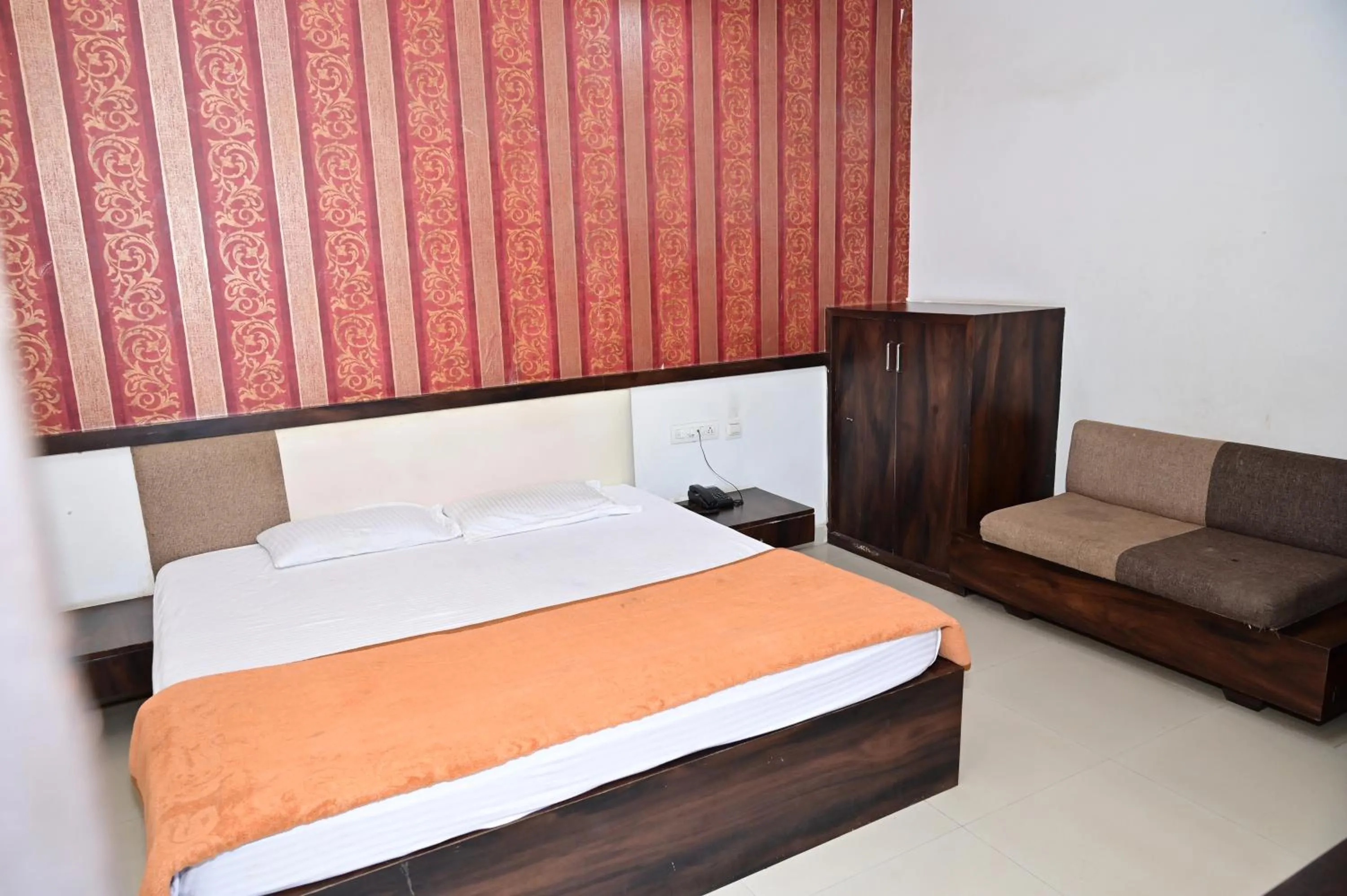 Bed in Sri Shivam Hotel
