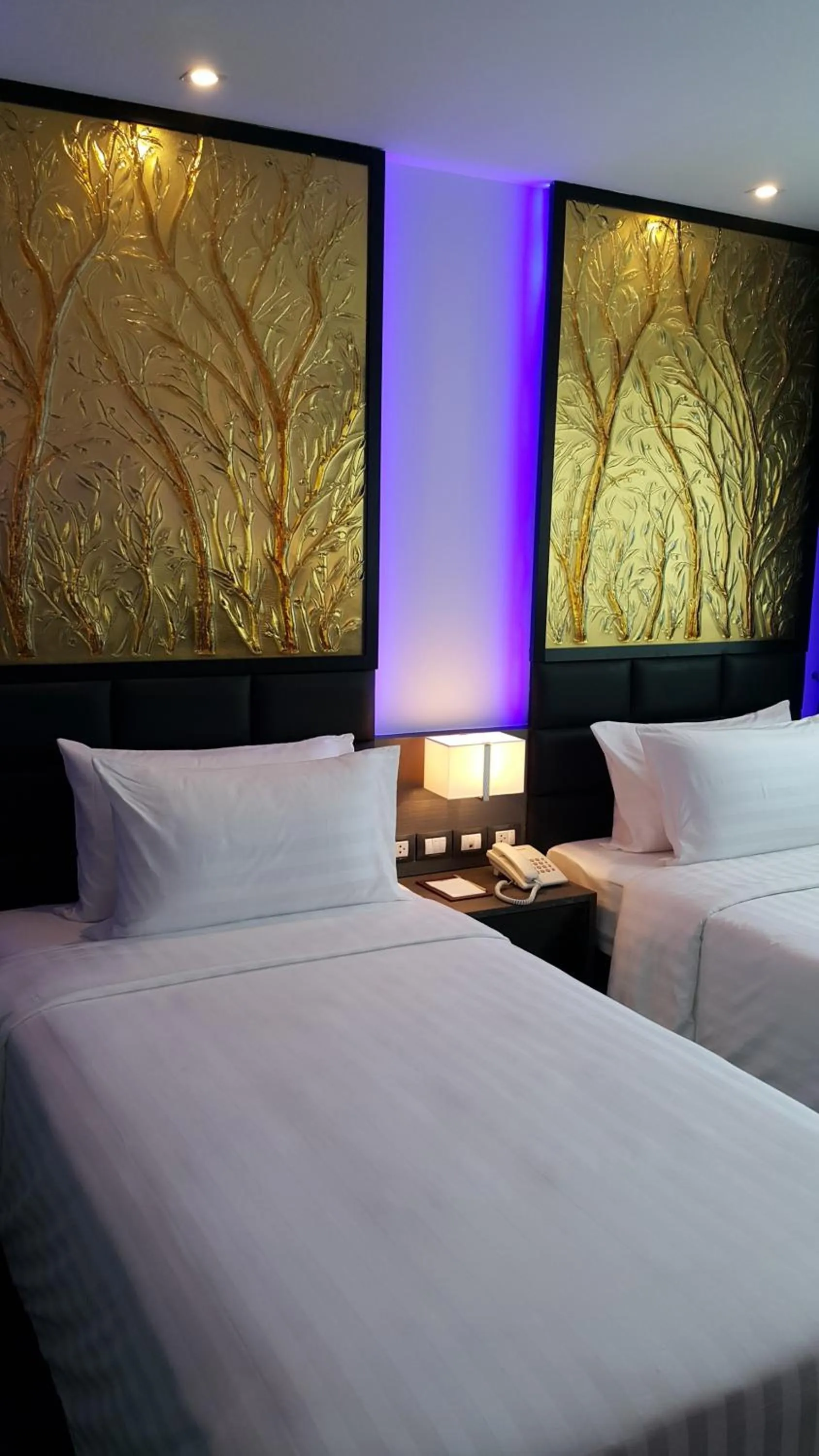 Bed in Nova Express Pattaya Hotel