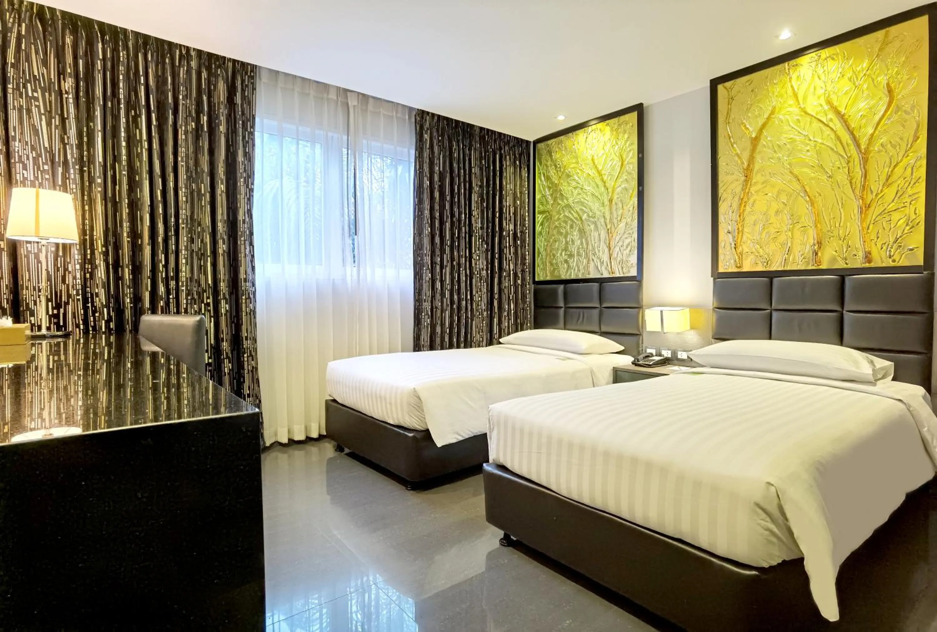 Bed in Nova Express Pattaya Hotel