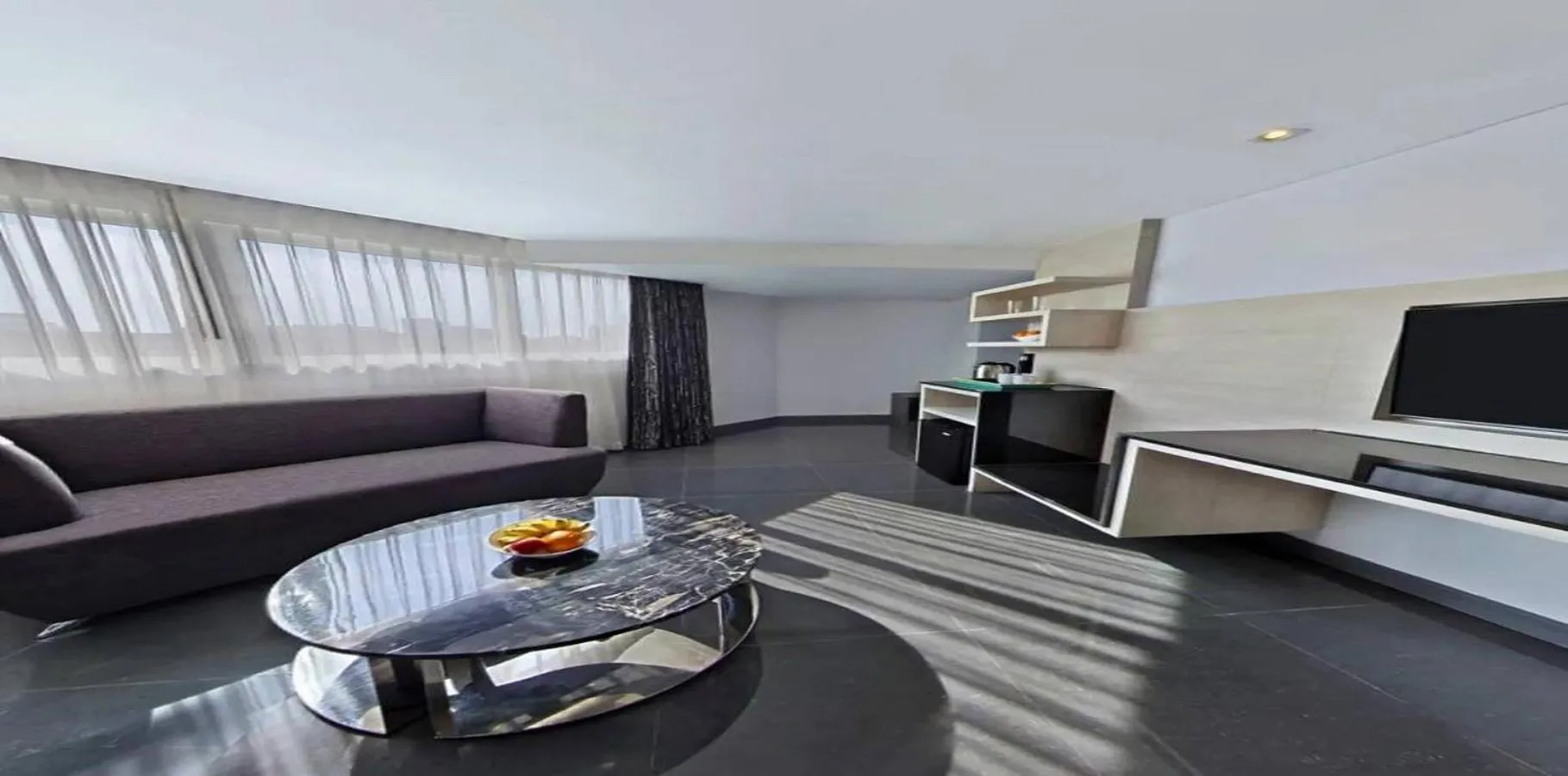 Seating area in Nova Express Pattaya Hotel