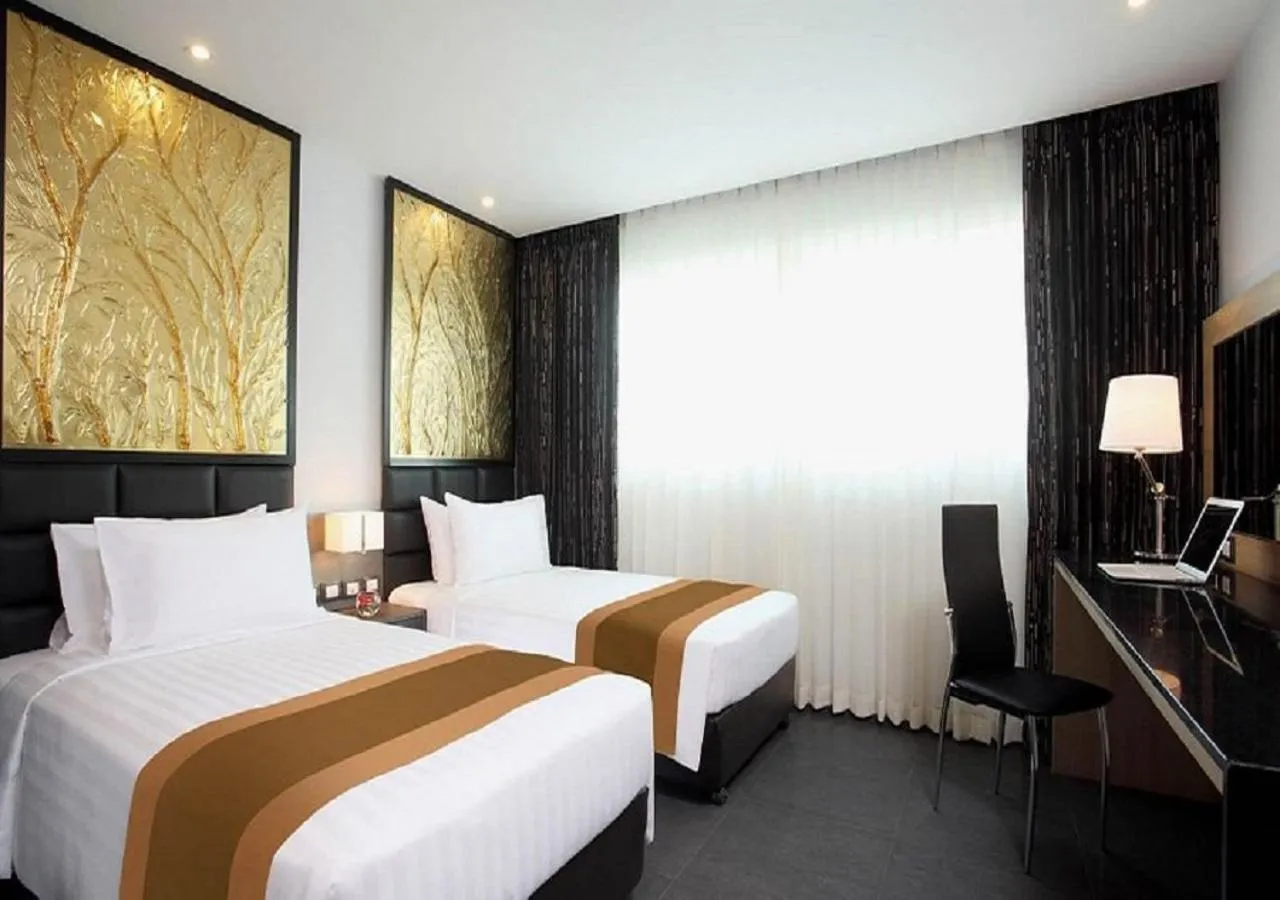 Bed in Nova Express Pattaya Hotel