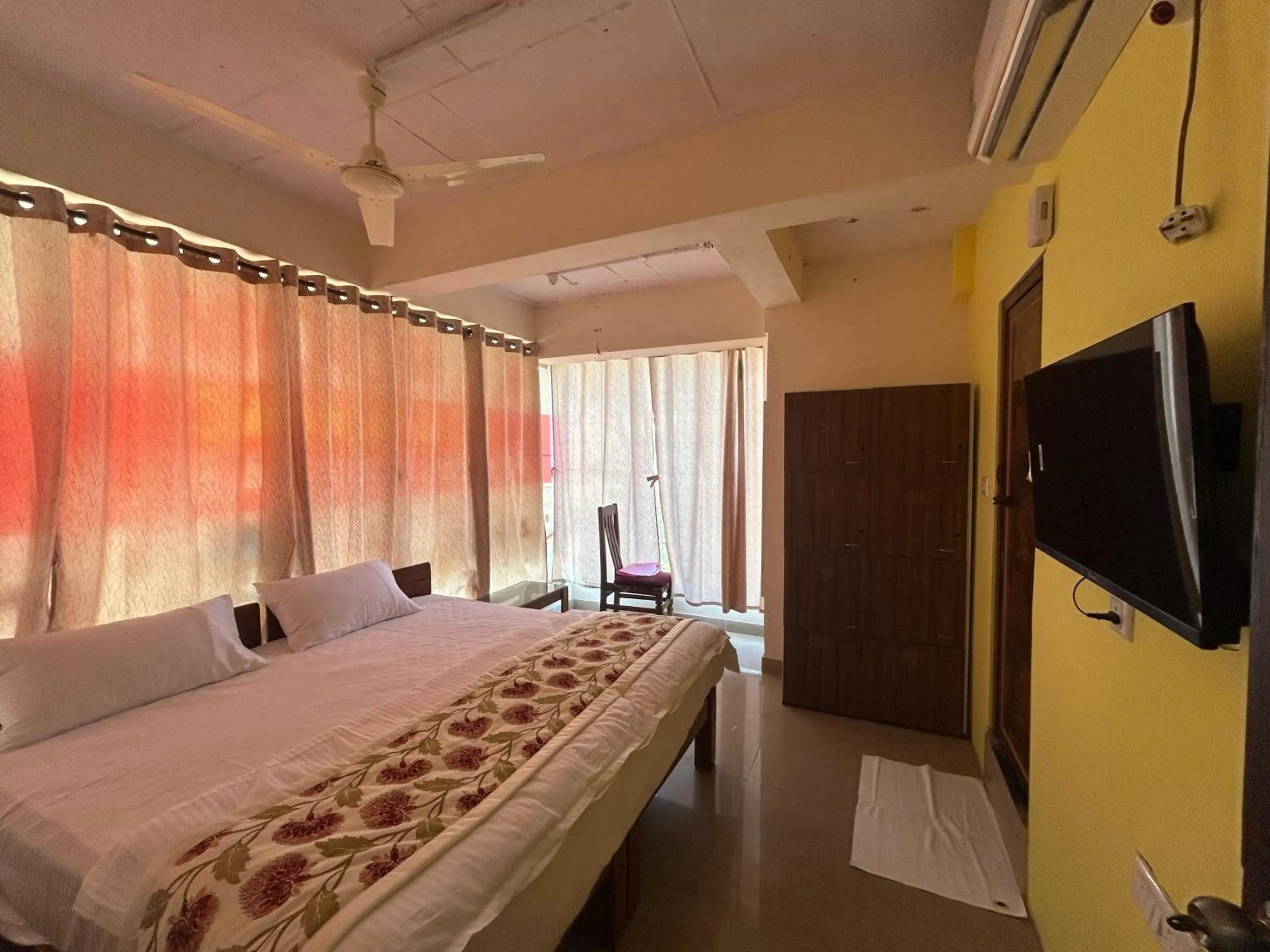 Bedroom, Bed in Hotel O Nesara Inn