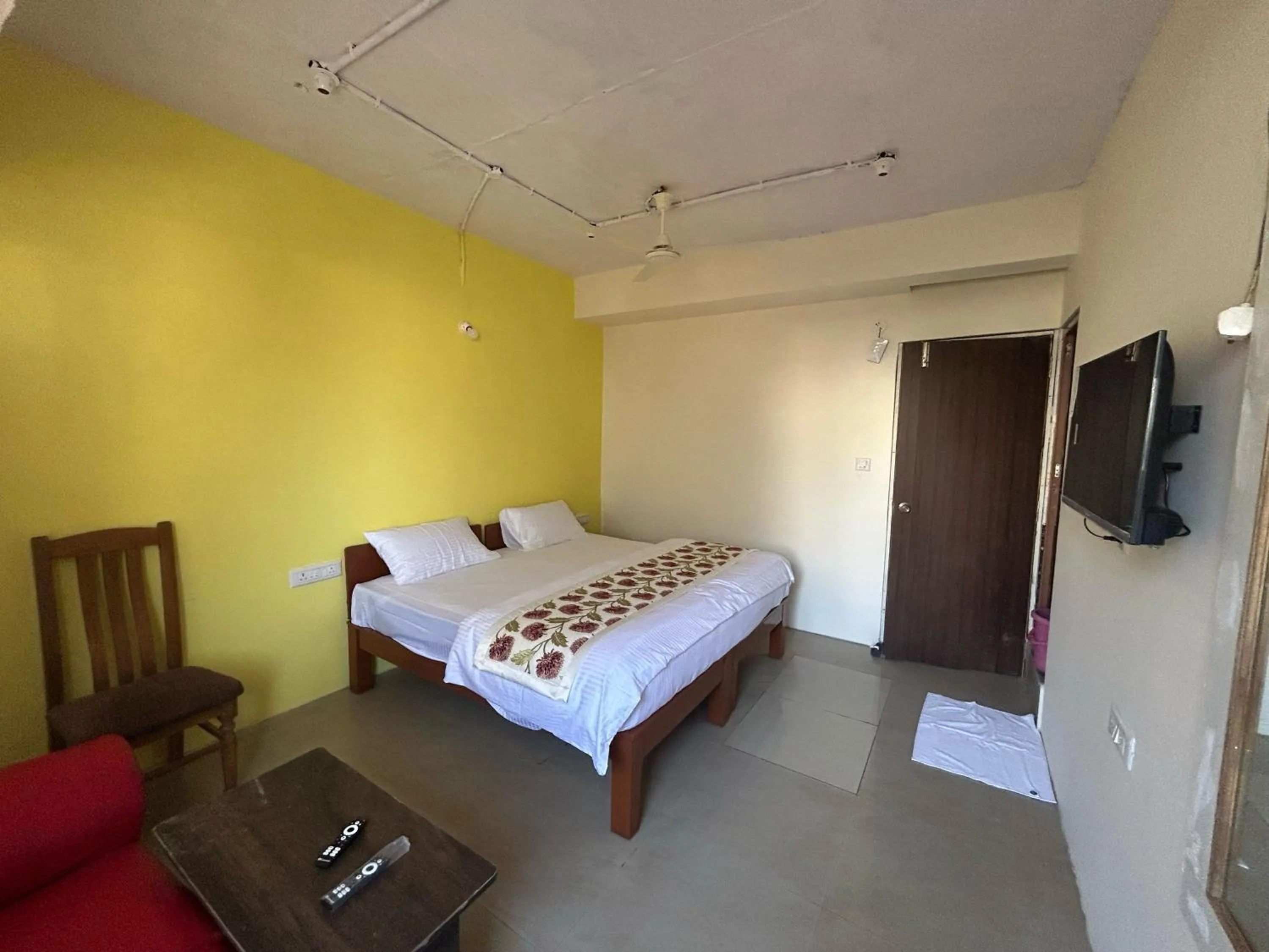 Bedroom, Bed in Hotel O Nesara Inn