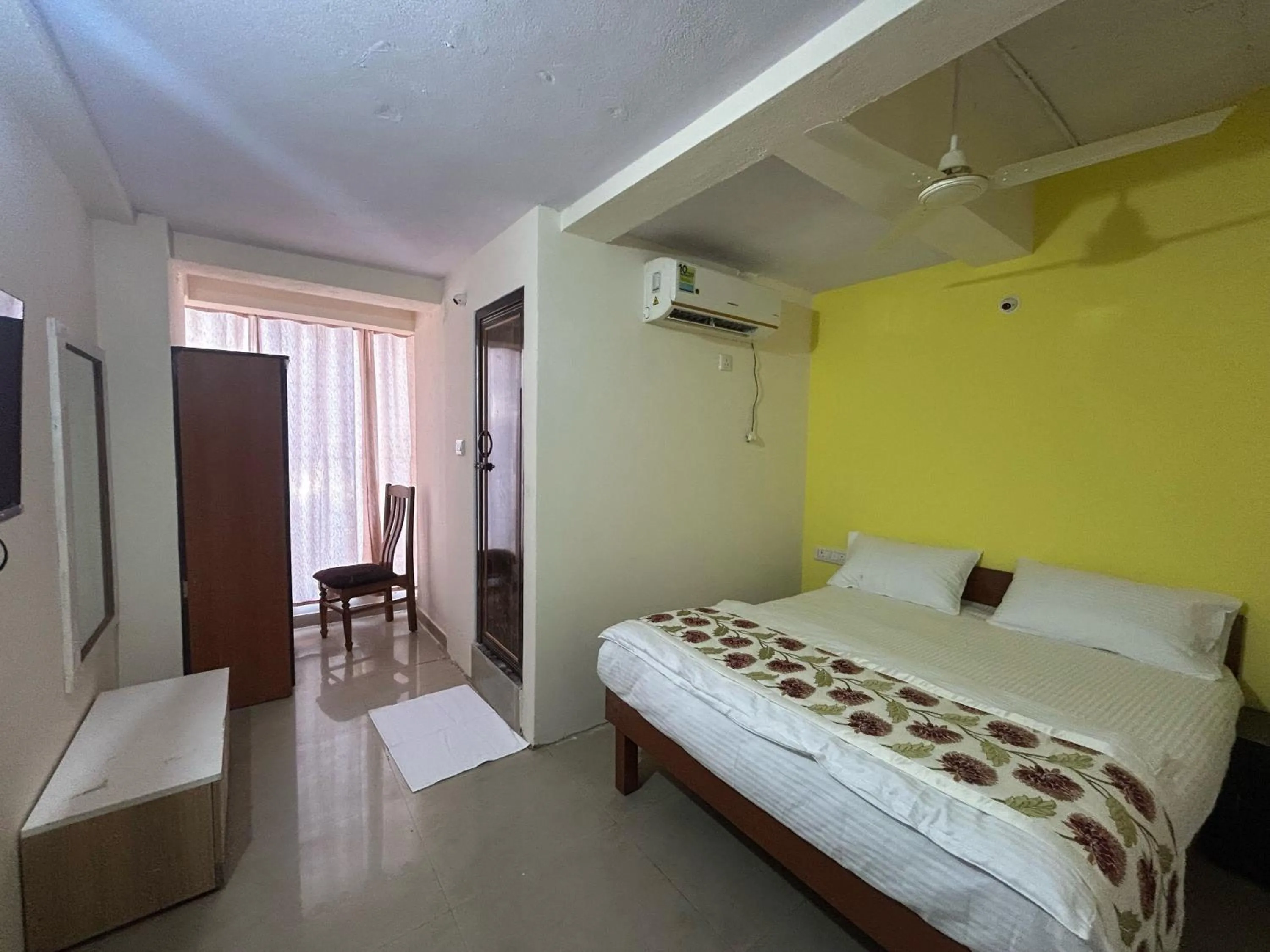 Bedroom, Bed in Hotel O Nesara Inn