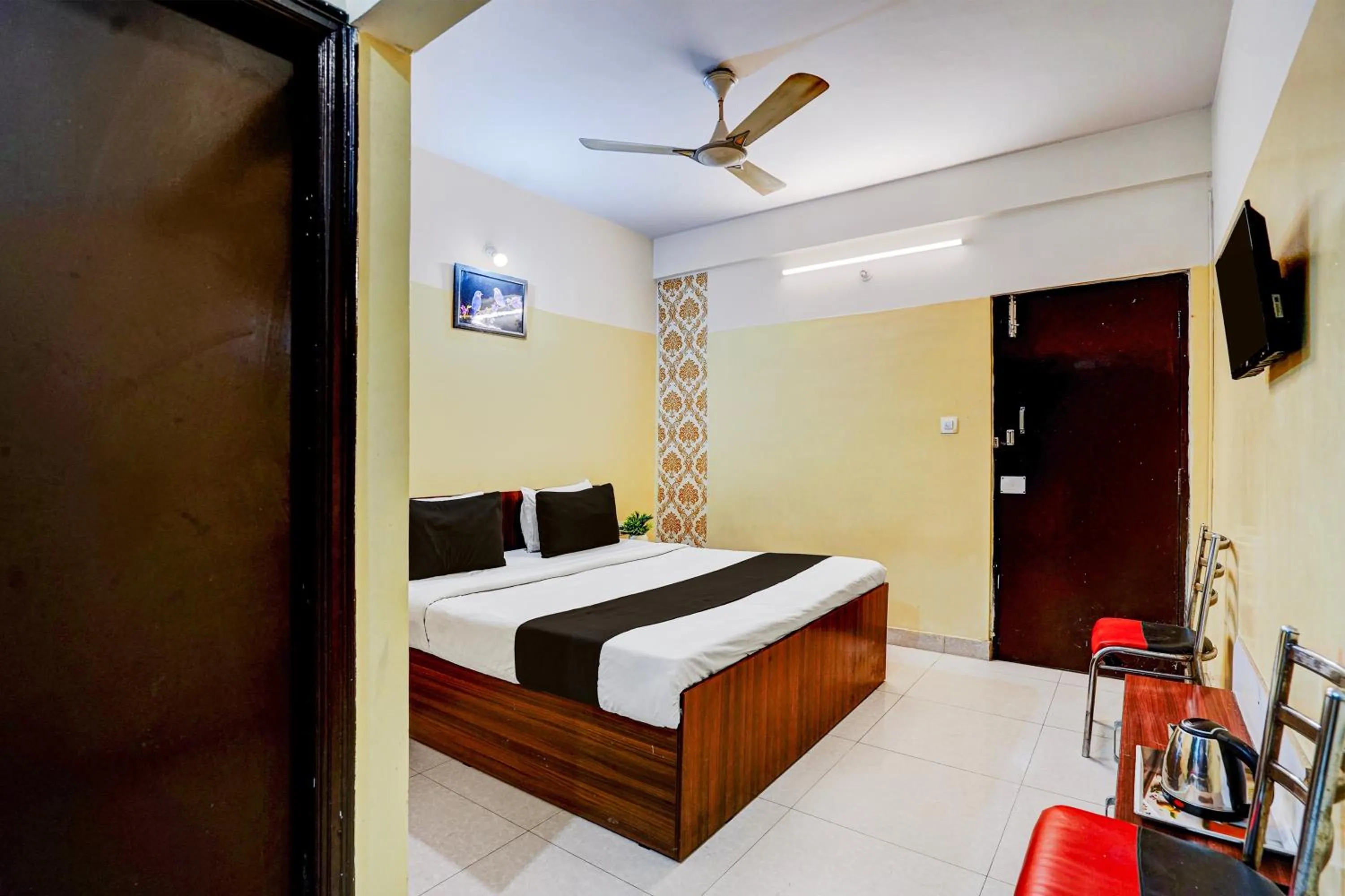 Bedroom, Bed in Hotel O Nesara Inn