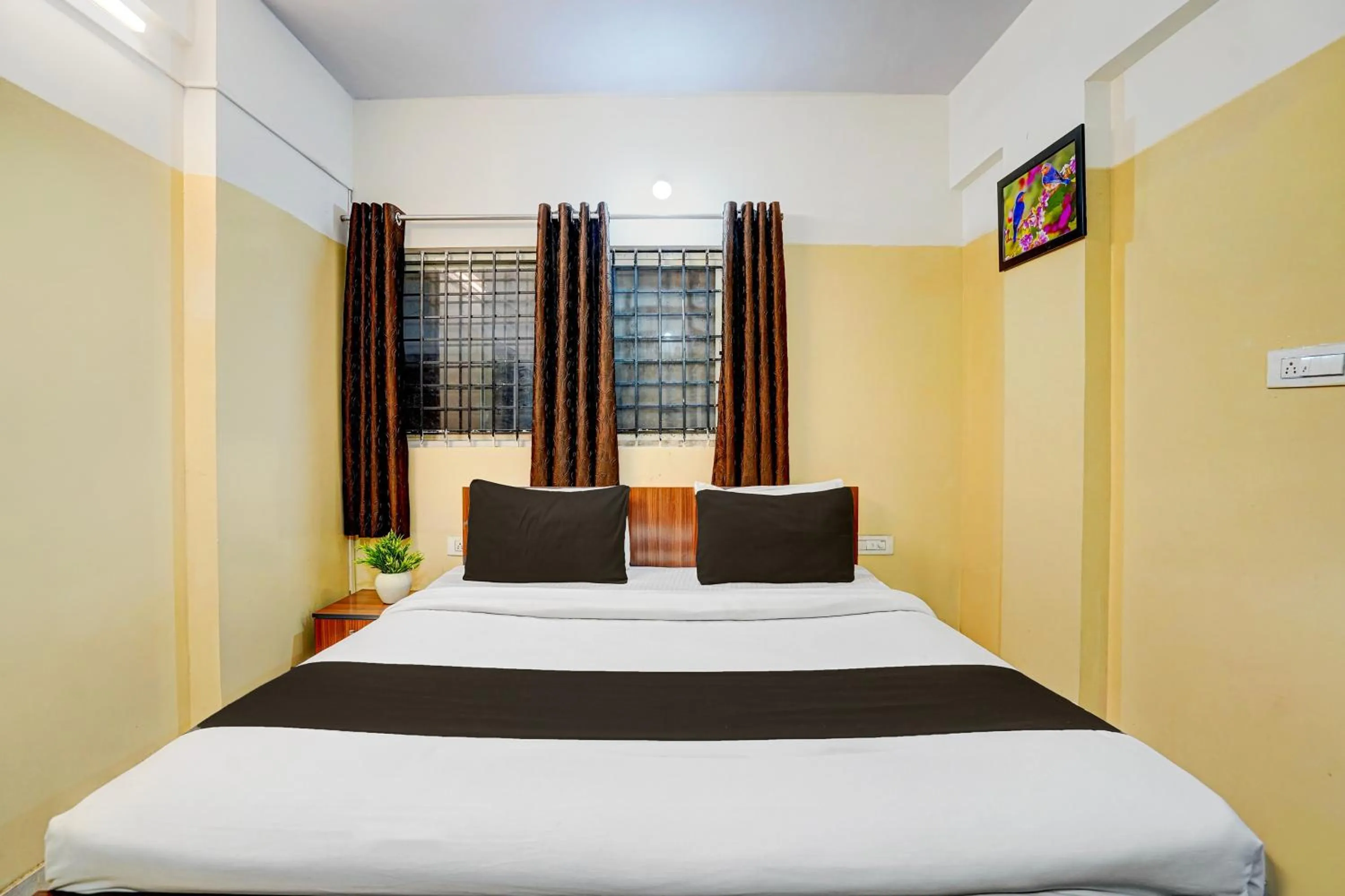 Bedroom, Bed in Hotel O Nesara Inn