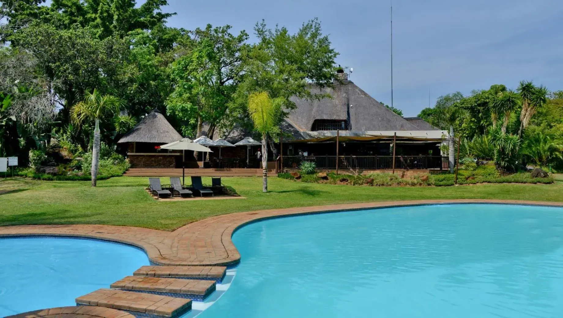 Swimming pool in Cambalala - Luxury Units - in Kruger Park Lodge - Serviced Daily, Free Wi-Fi Swimming pool in Cambalala - Luxury Units - in Kruger Park Lodge - Serviced Daily, Free Wi-Fi