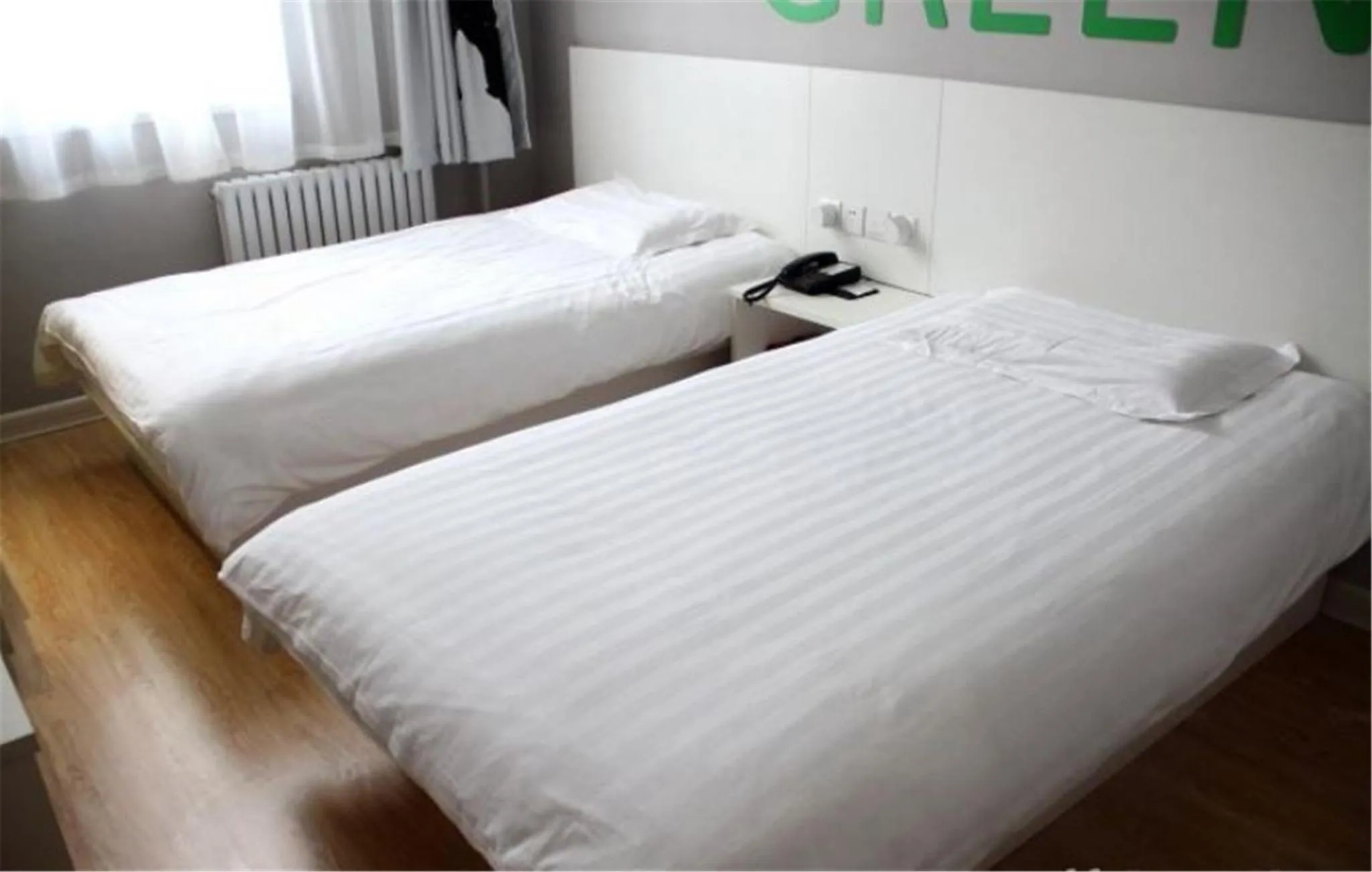 Bed in Motel Ji'nan Shandong University Shanda Road