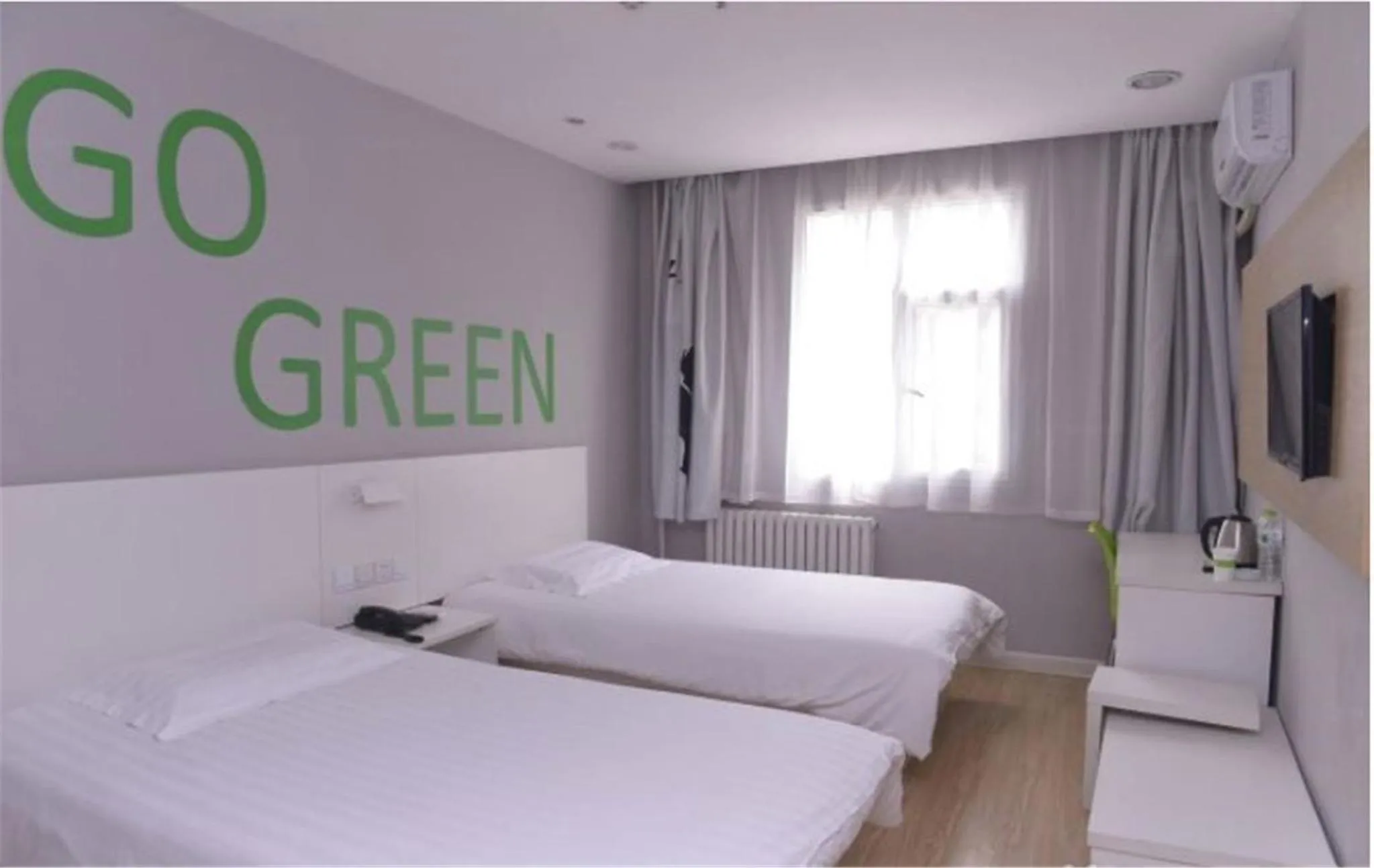 Bed in Motel Ji'nan Shandong University Shanda Road