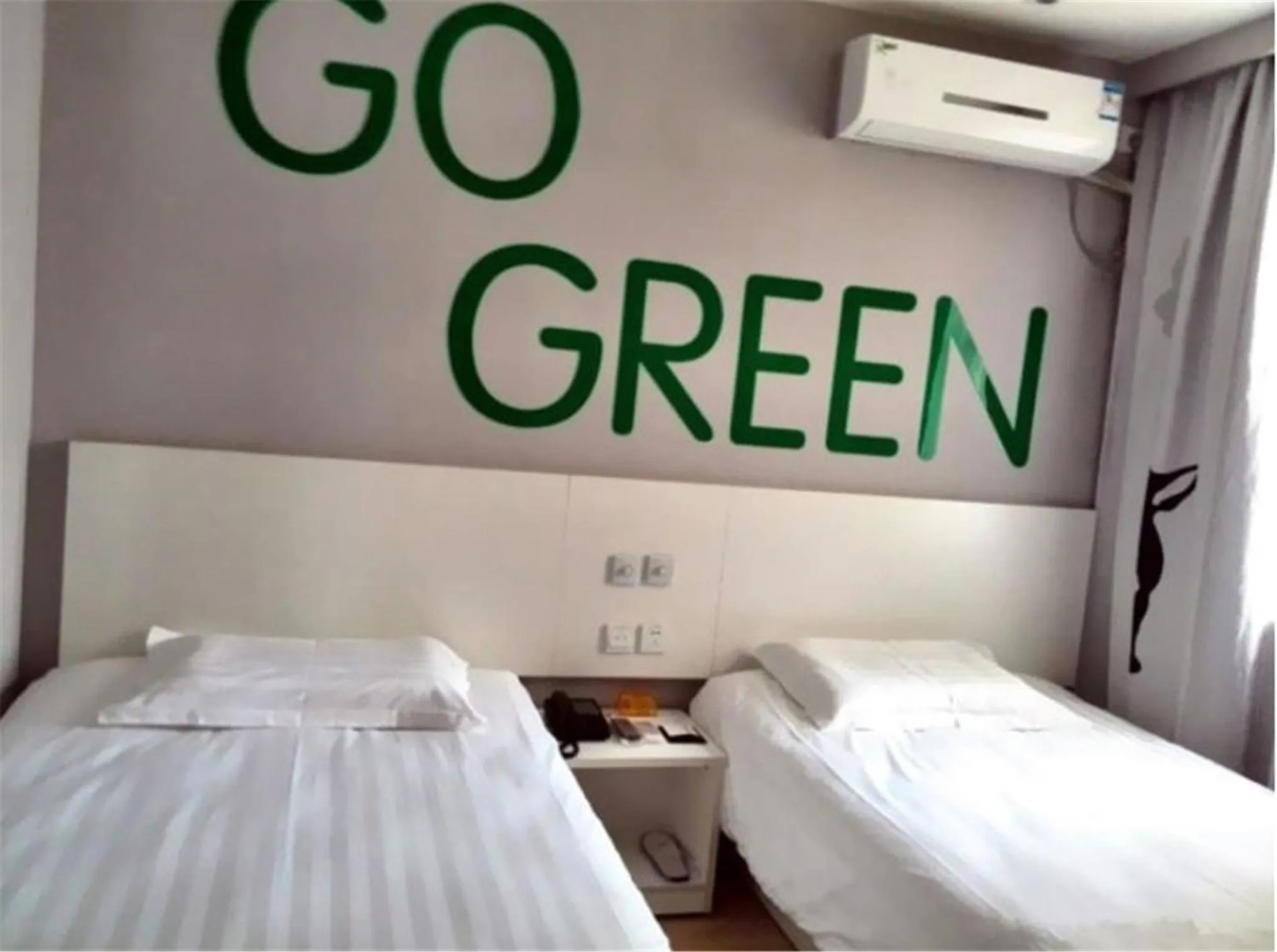 Bed in Motel Ji'nan Shandong University Shanda Road
