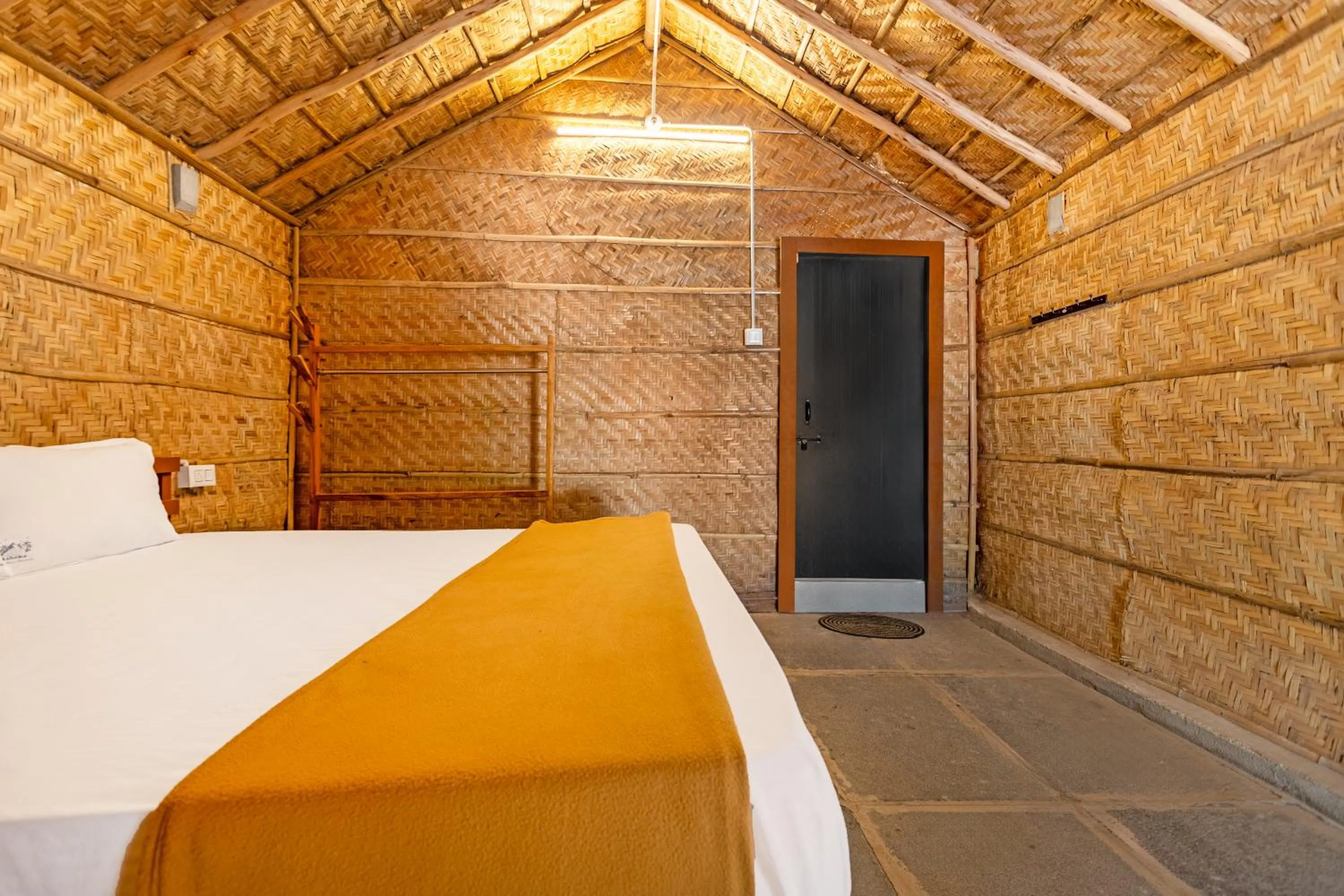 Photo of the whole room, Bed in Nature Trails Ashoka Resorts Hampi