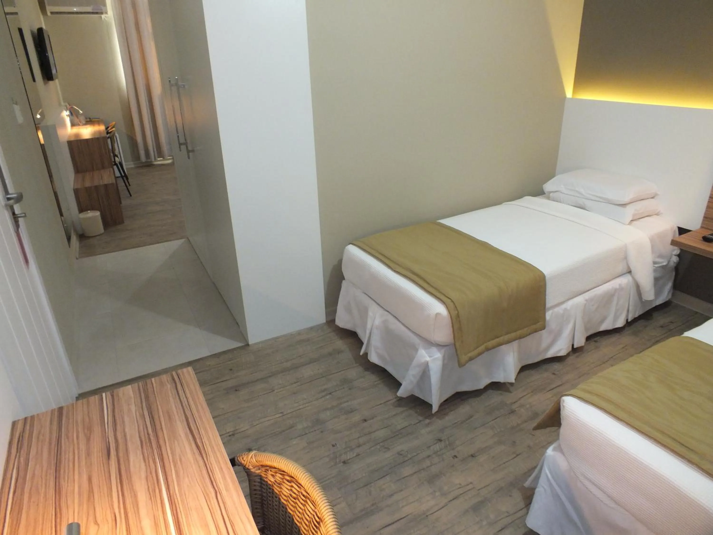 Bed in JB Palace Hotel