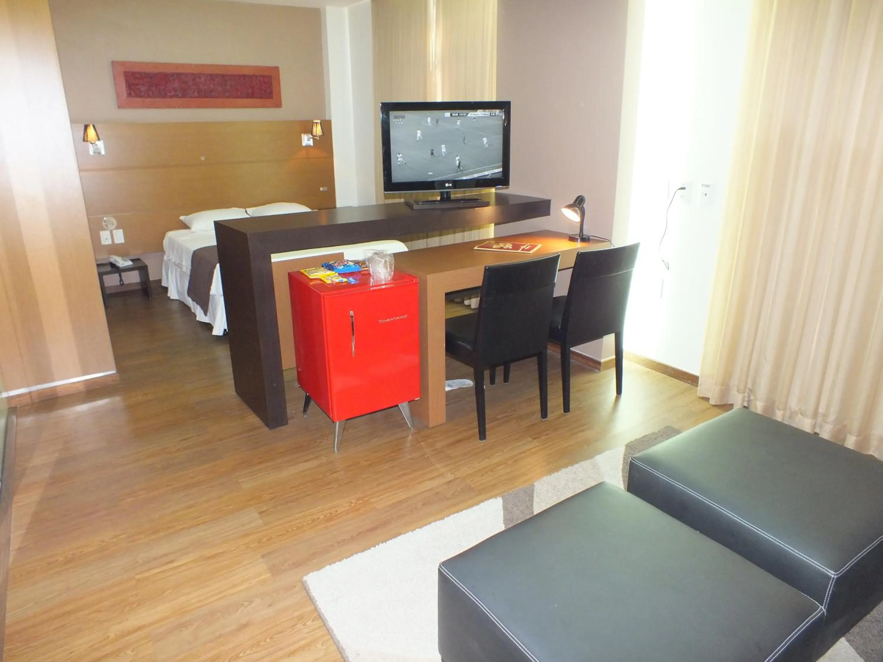 Dining area, Bed in JB Palace Hotel