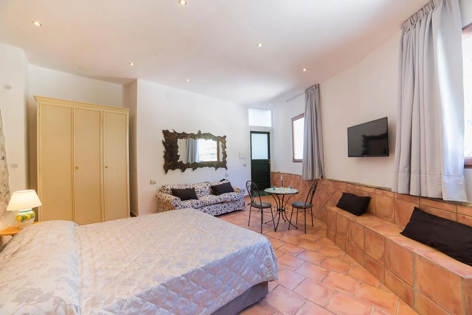 Communal lounge/ TV room, Bed in CVM Montagnella Relax