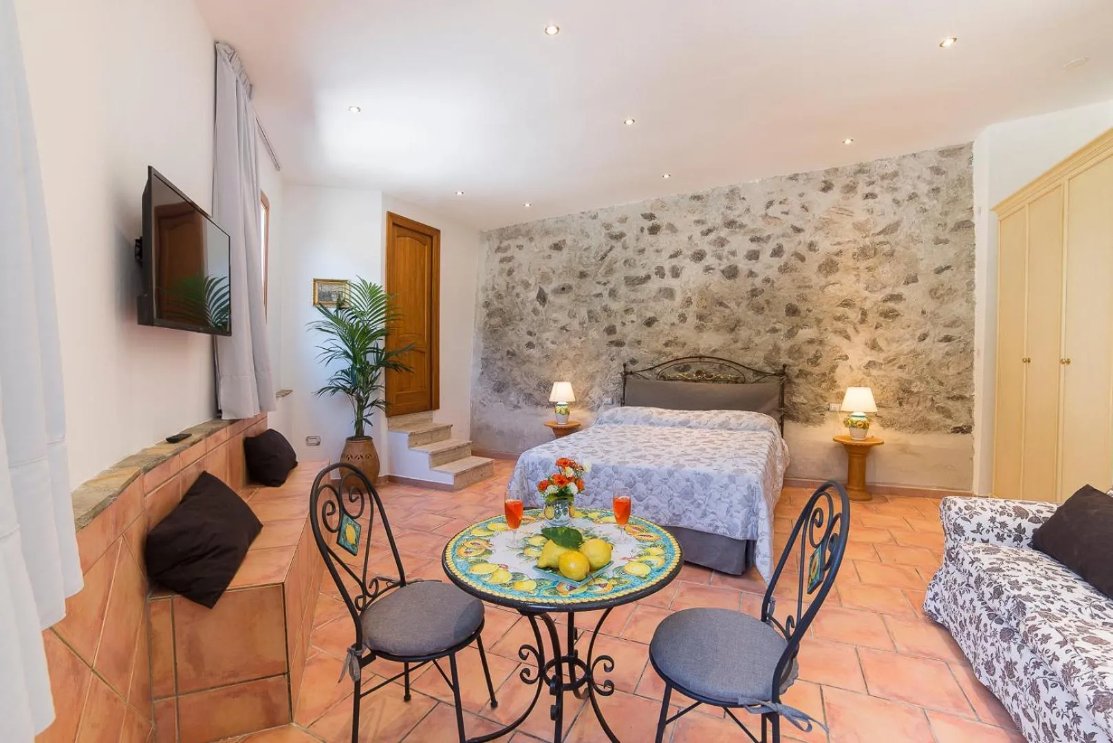 Communal lounge/ TV room, Bed in CVM Montagnella Relax