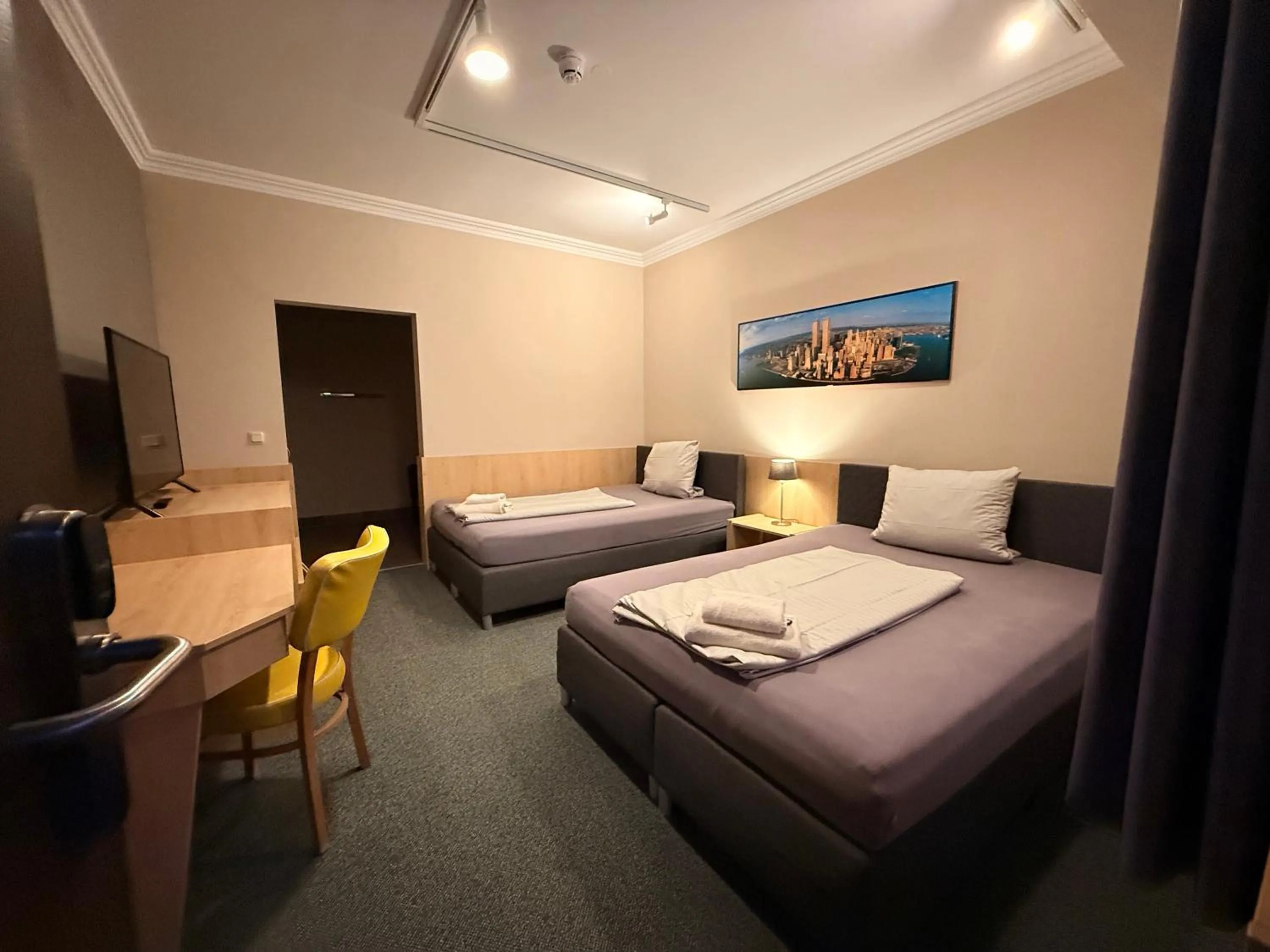 Photo of the whole room, Bed in Sportschule Bitburg - Sportpark-Hotel