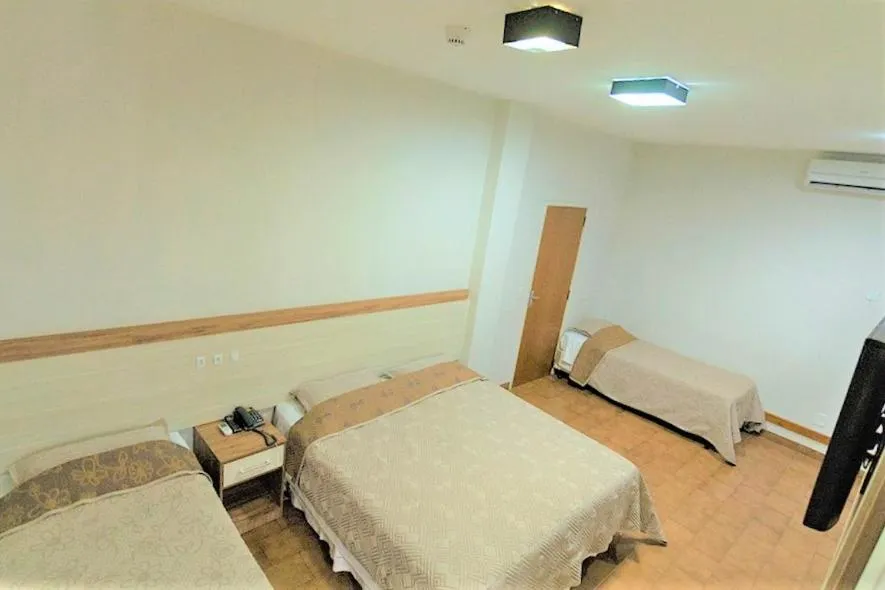 Bed in Hotel Pouso Novo