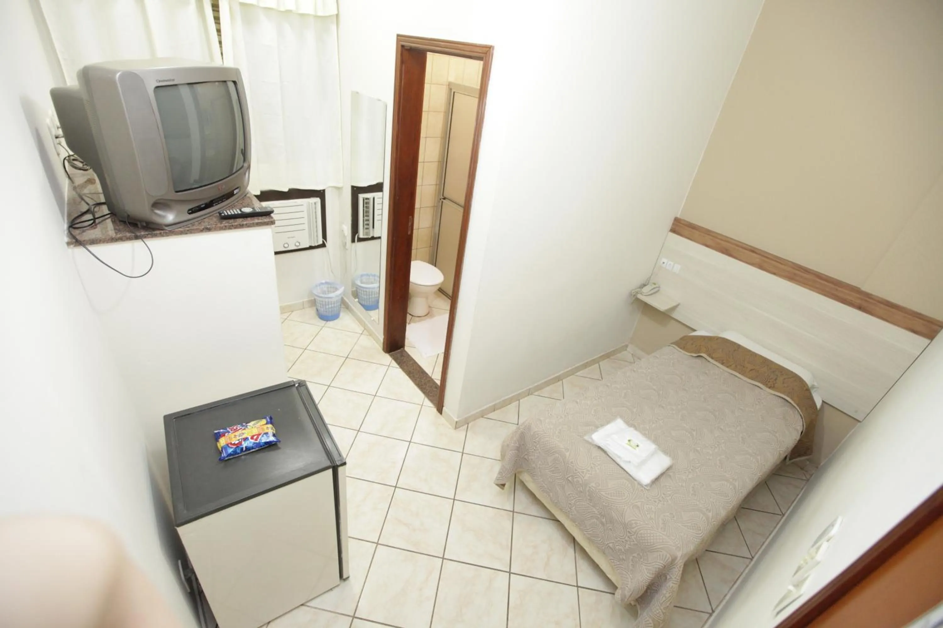 Bed in Hotel Pouso Novo