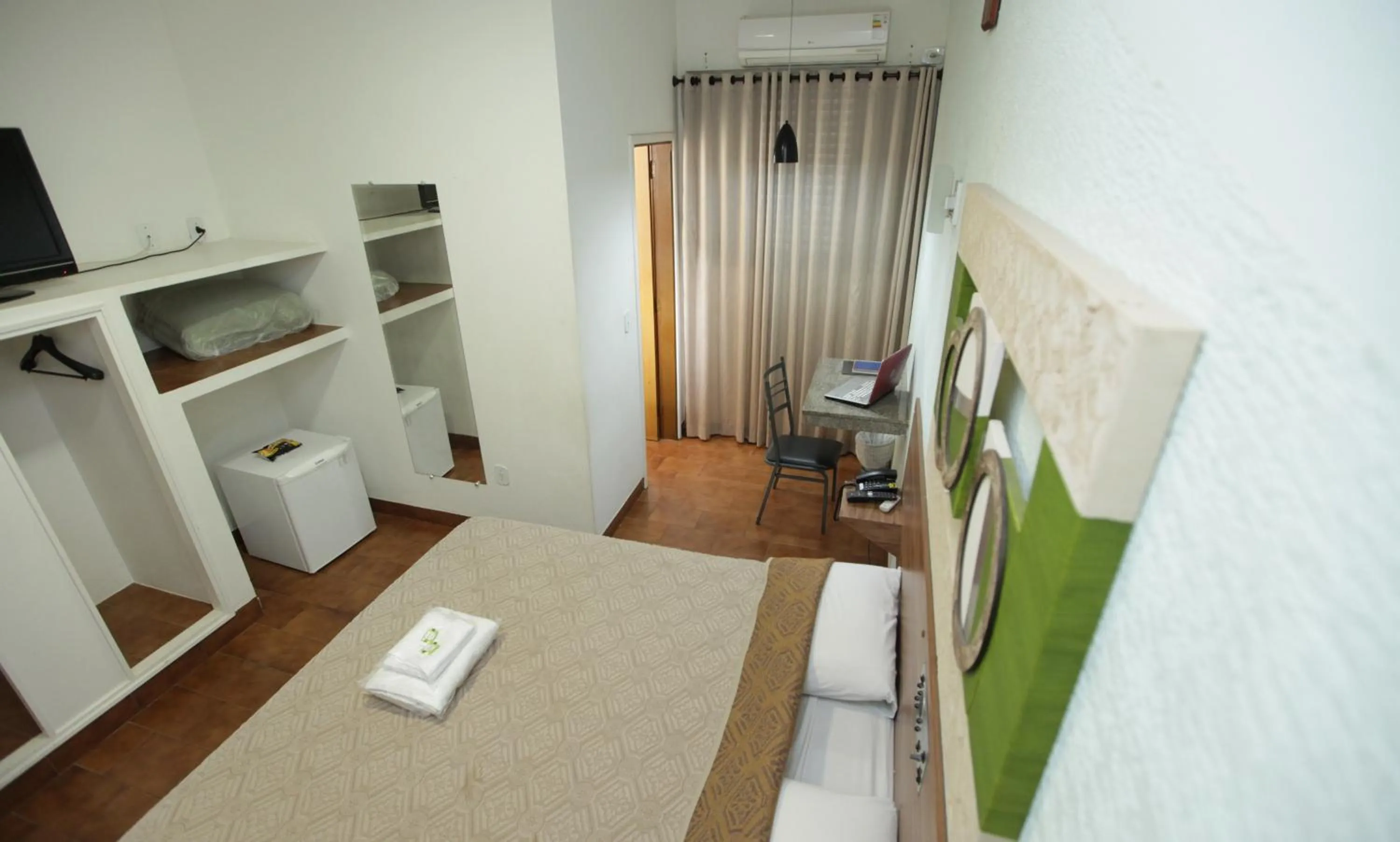 Bed in Hotel Pouso Novo