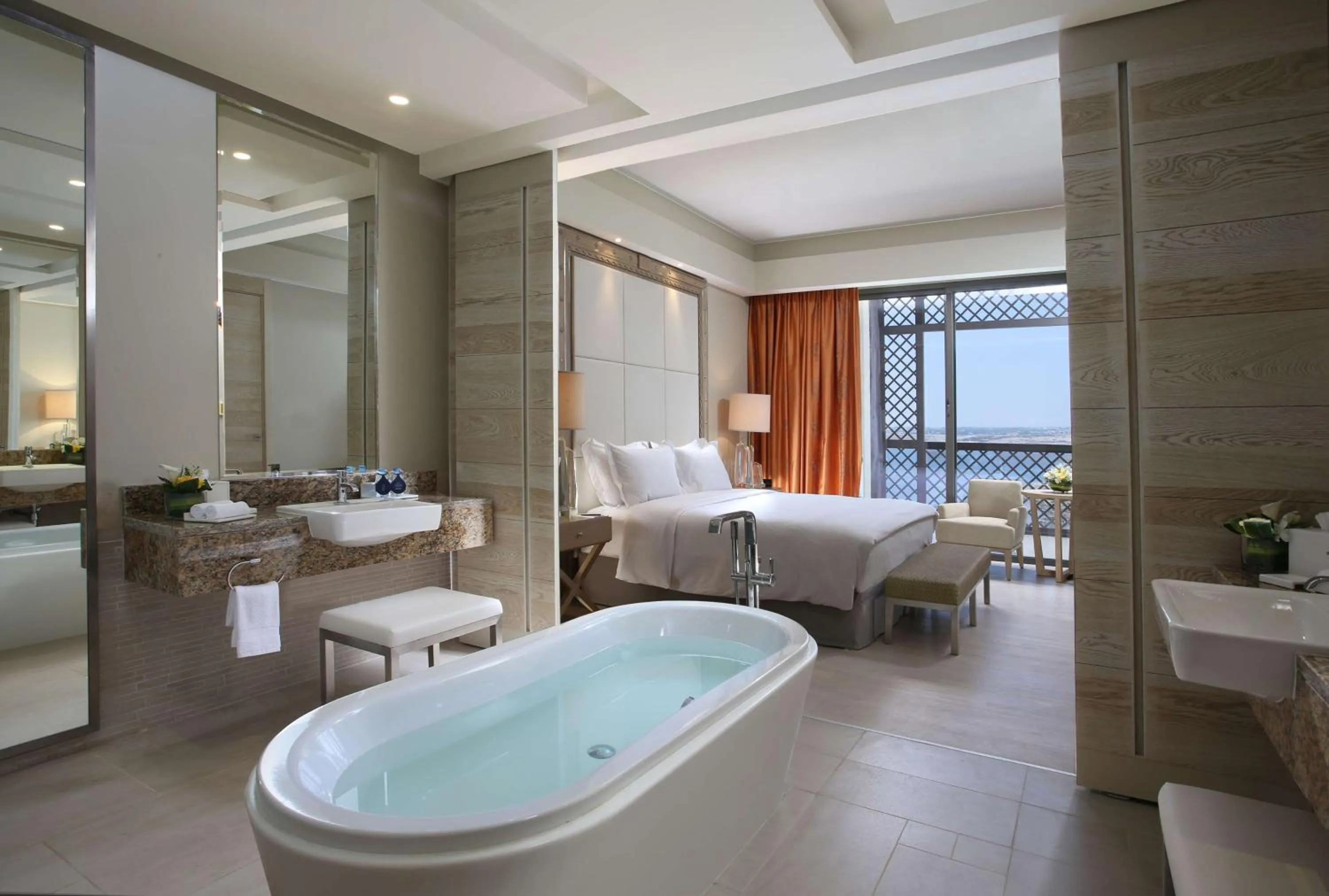 Bathroom, Bed in Hilton Dead Sea Resort & Spa