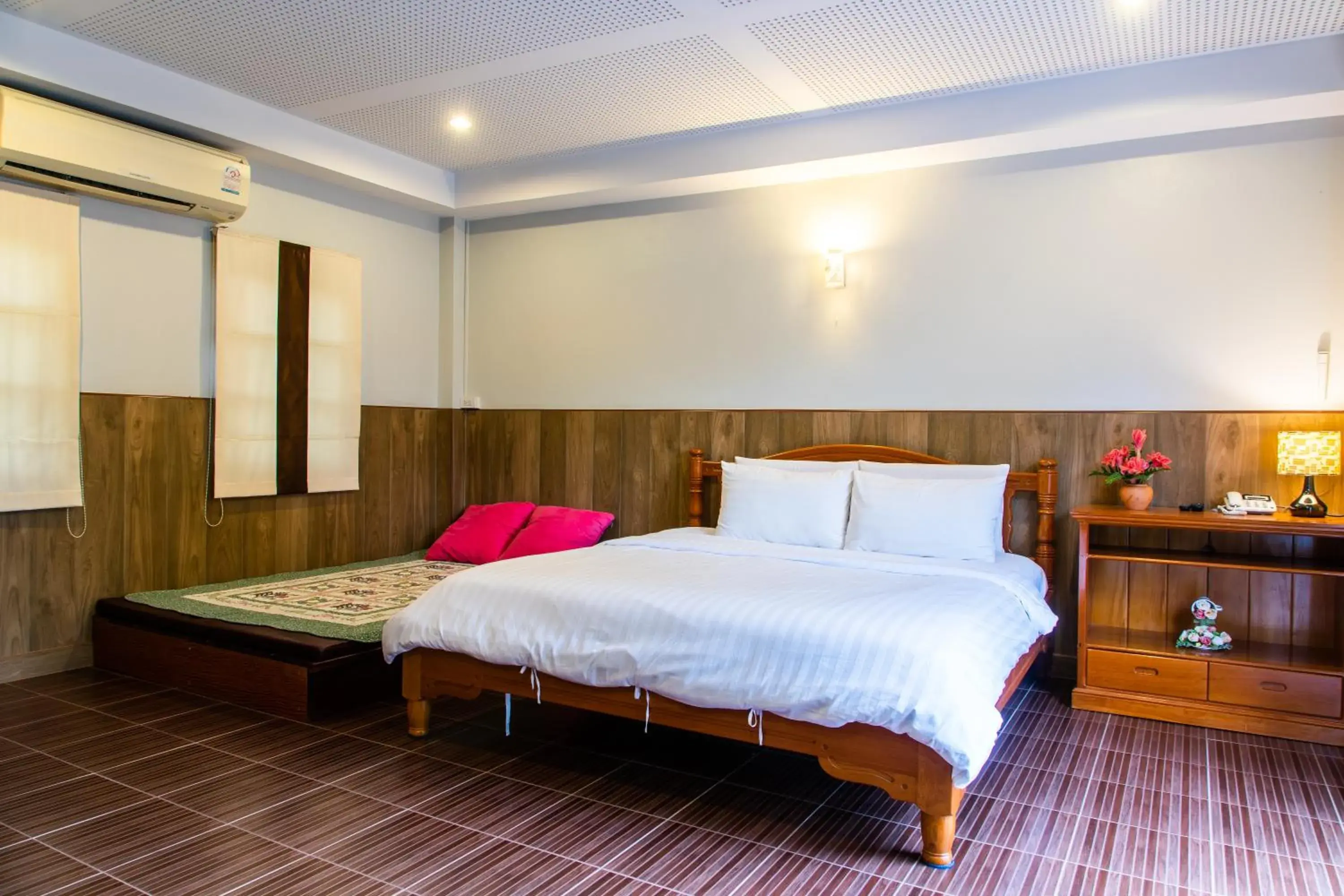 Bed in BaanRimNam Resort Trat Bed in BaanRimNam Resort Trat