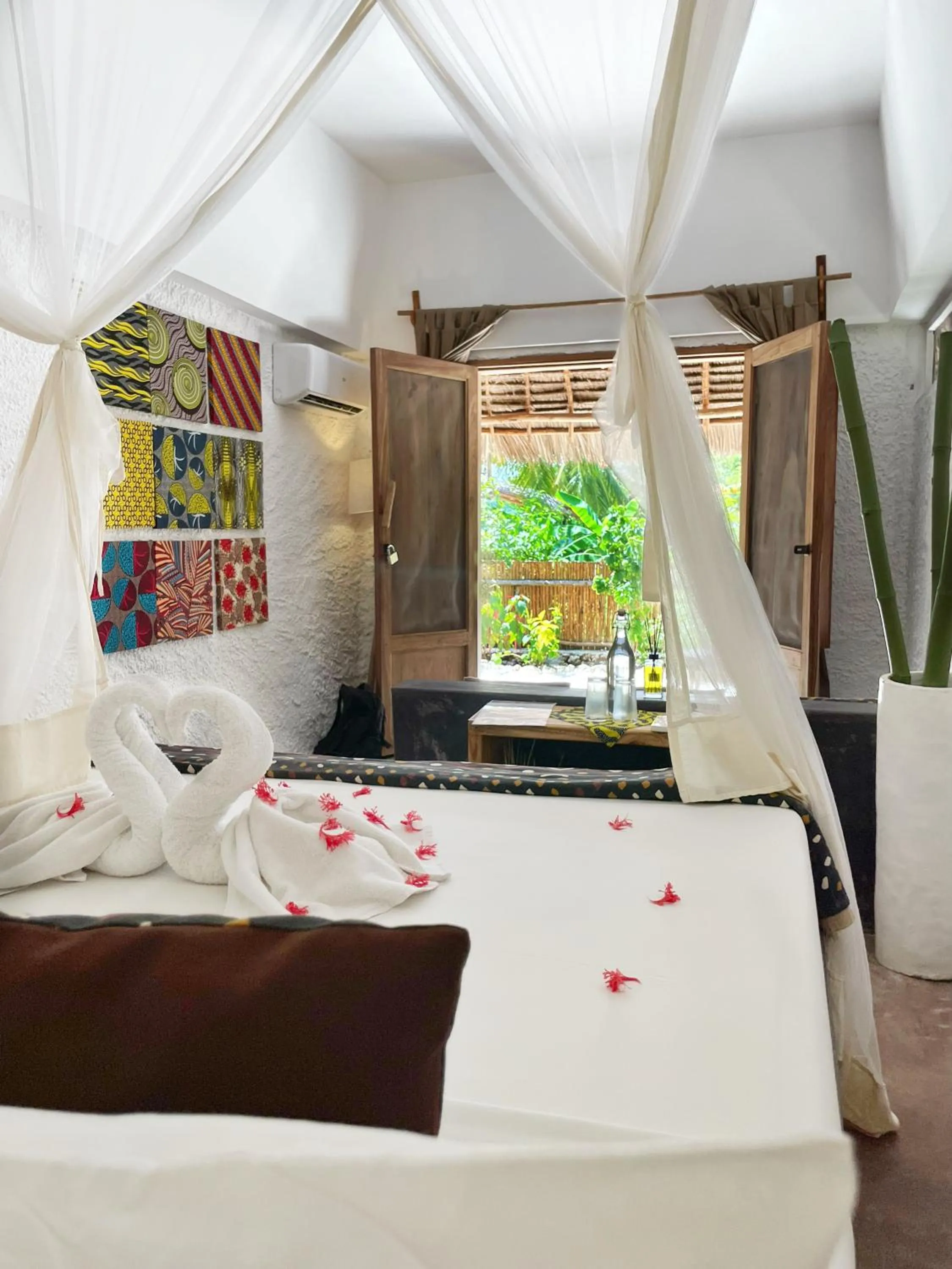 Photo of the whole room, Bed in Mwezi Boutique Resort