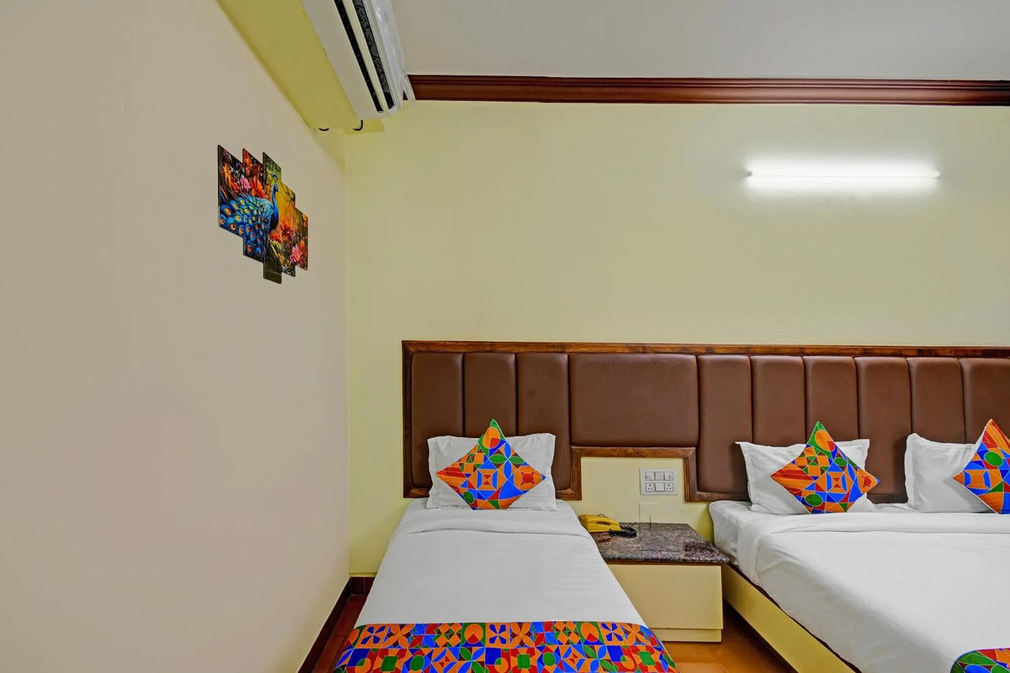 Bed in FabHotel Ranjit Residency