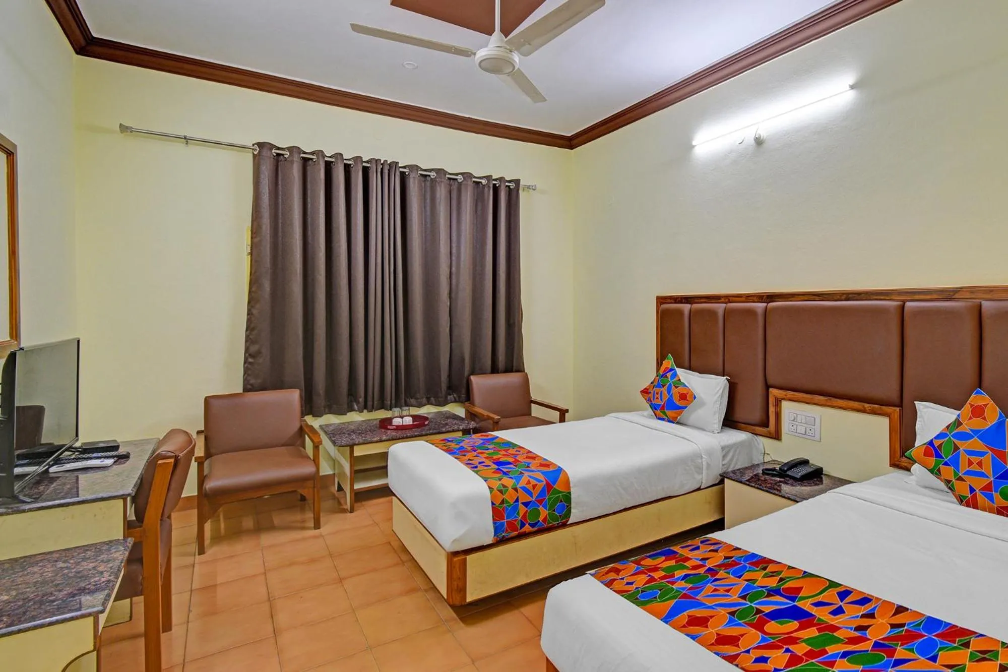 Bed in FabHotel Ranjit Residency
