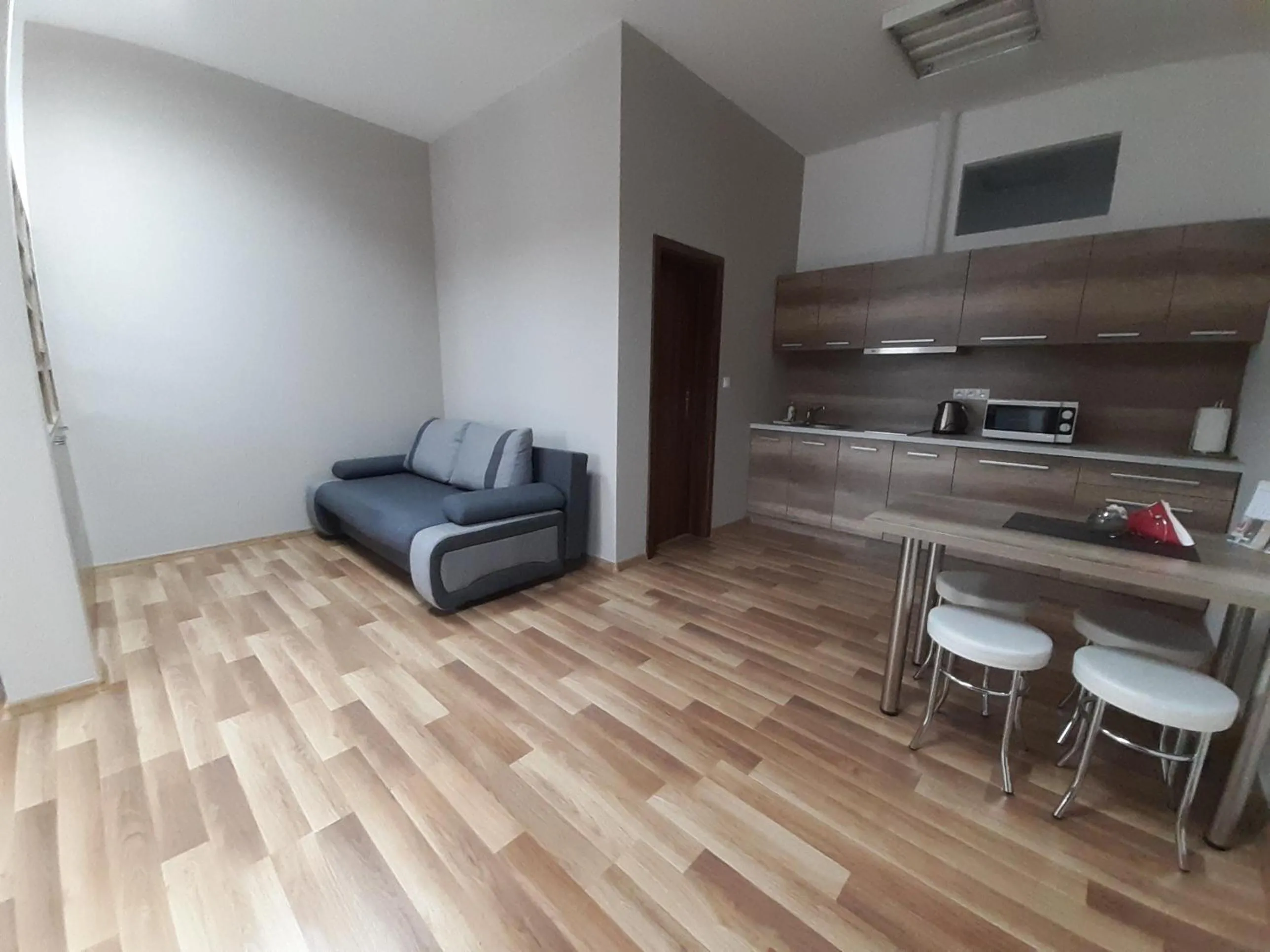 Kitchen or kitchenette in Apartments MODOM