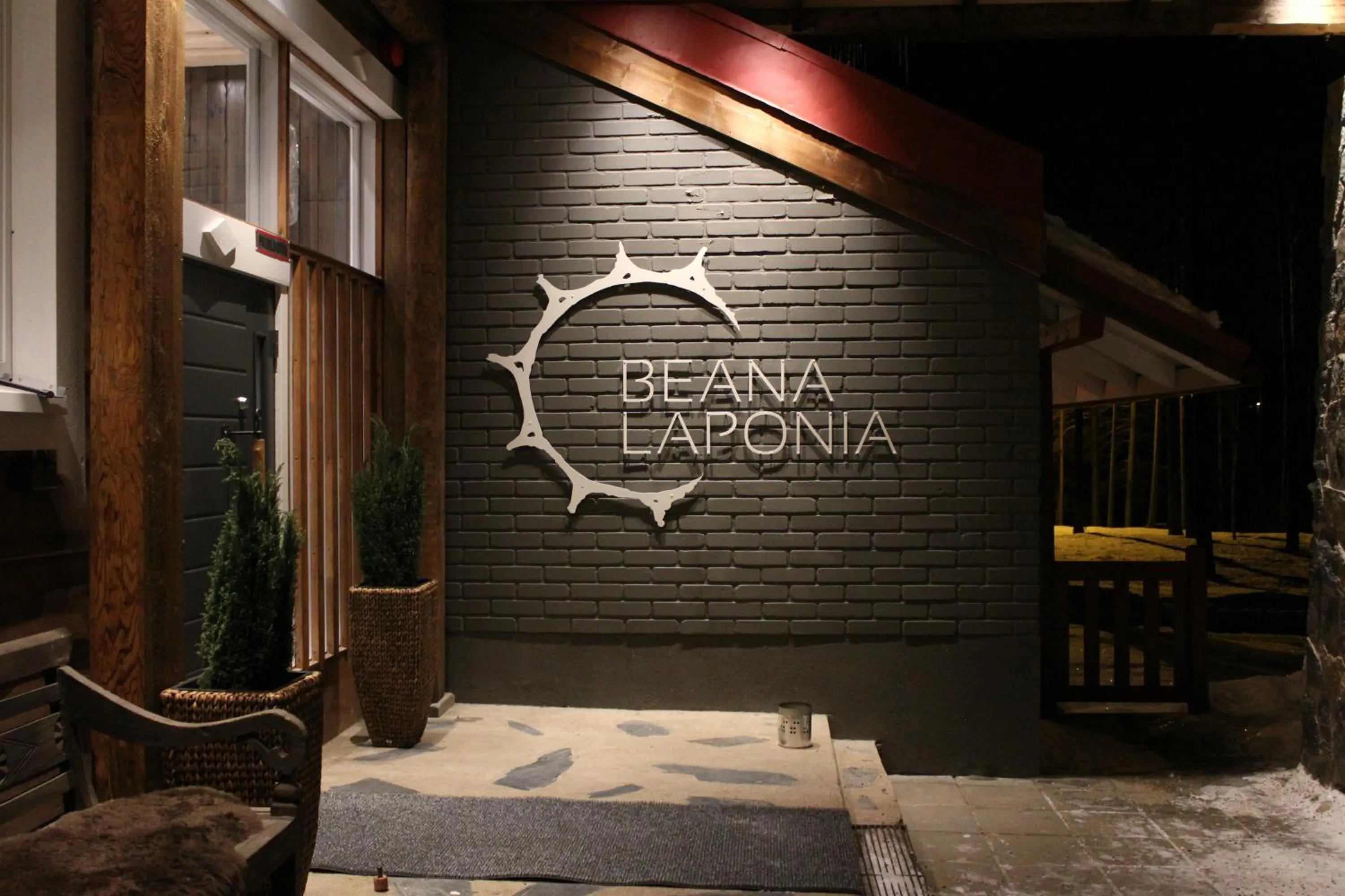 Property logo or sign in Beana Laponia - Wilderness boutique hotel with safaris