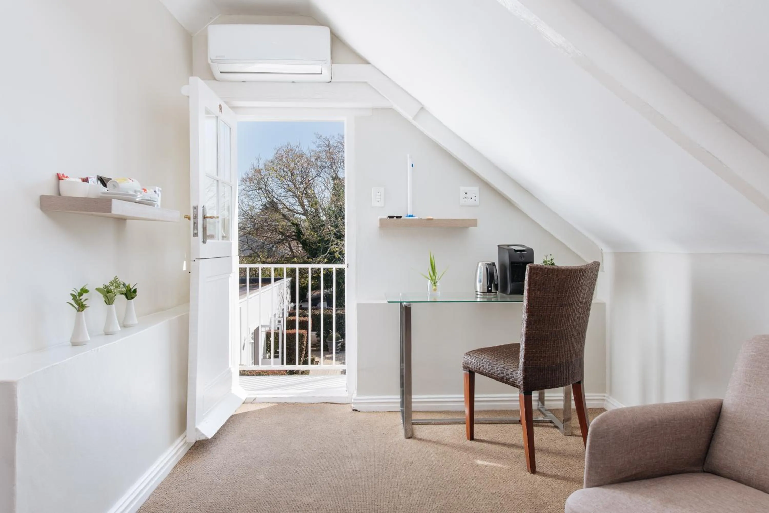 Seating area in River Manor Boutique Hotel by The Living Journey Collection