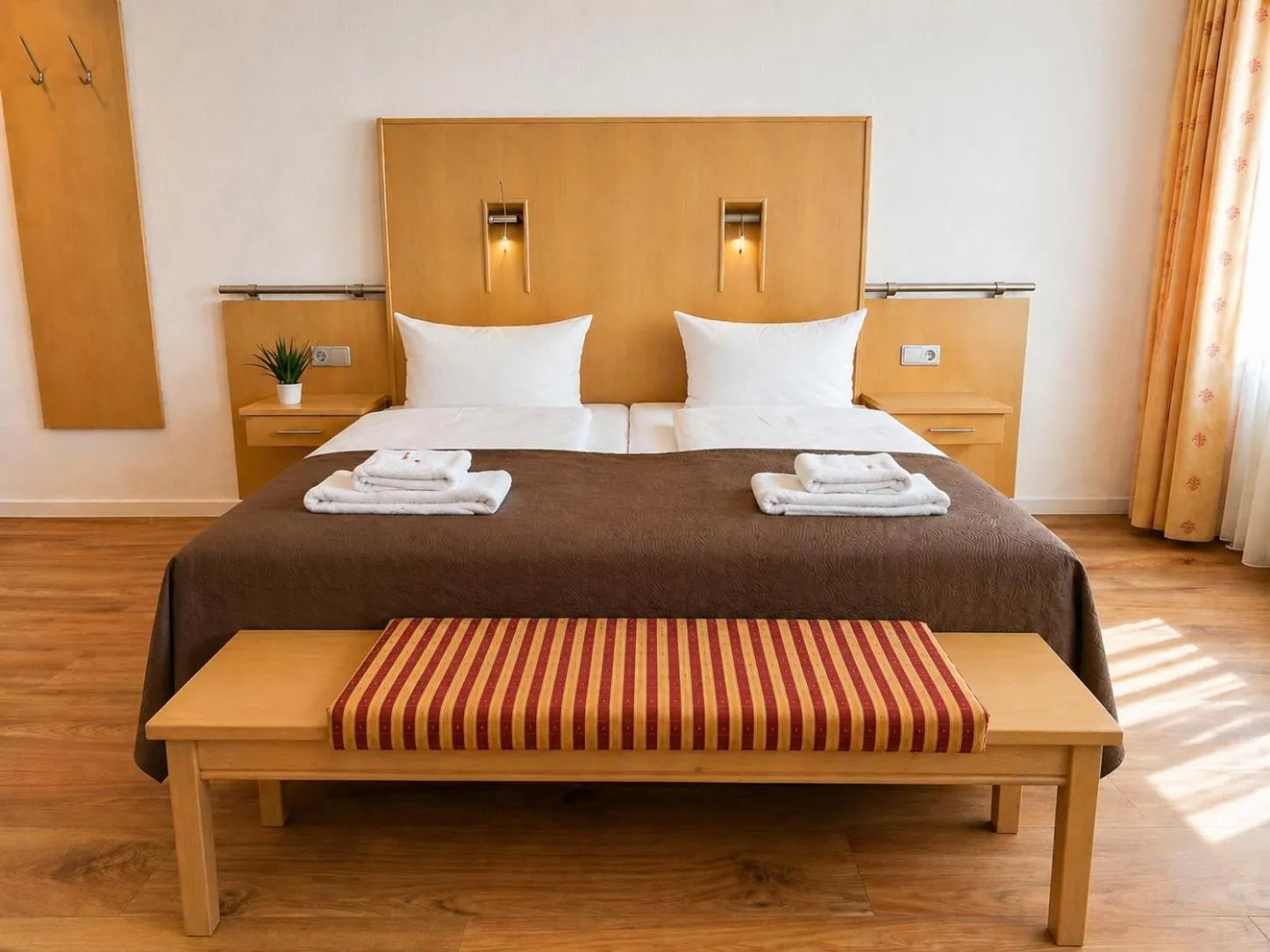 Bed in Hotel Wania