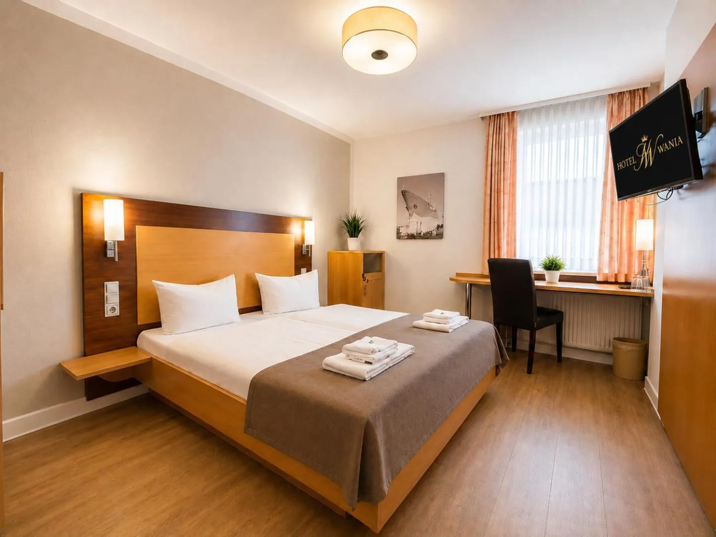 Bed in Hotel Wania