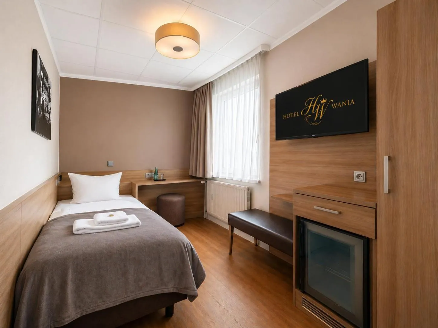 Bed in Hotel Wania